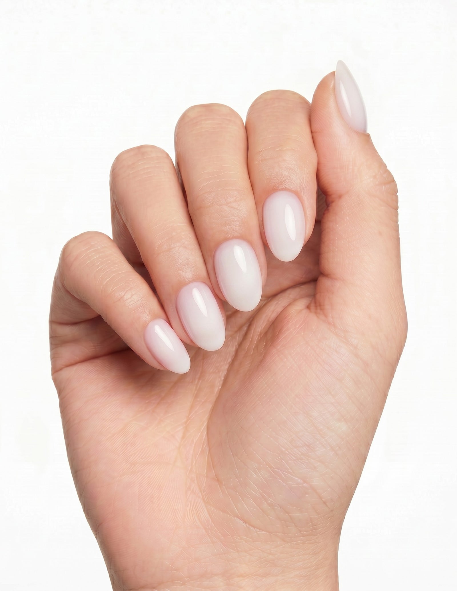 Soap Nail press-on nails — Almond (extra-short), deep-skin hand, fingers curled
