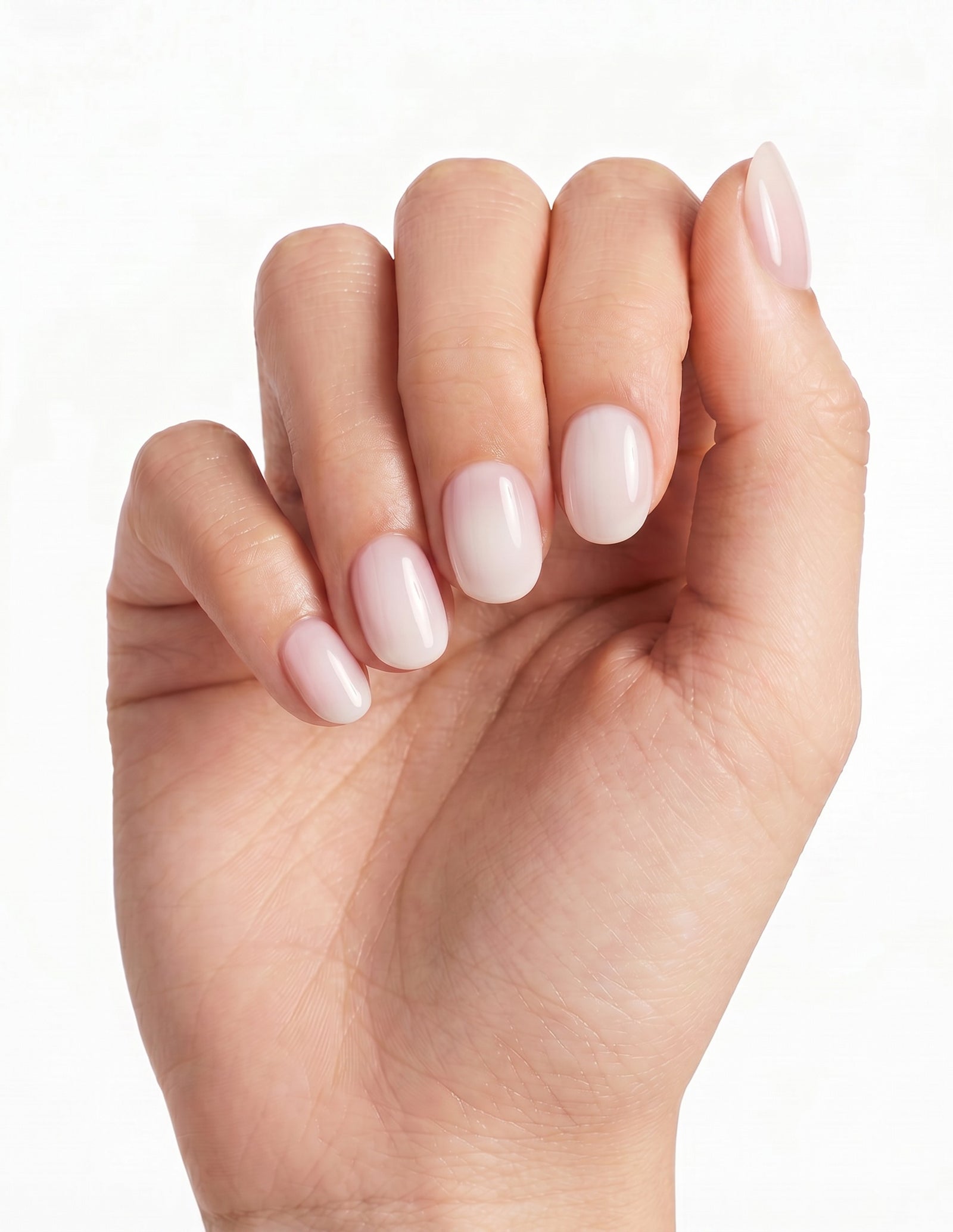 Soap Nail press-on nails — Oval (extra-short), deep-skin hand, back of hand