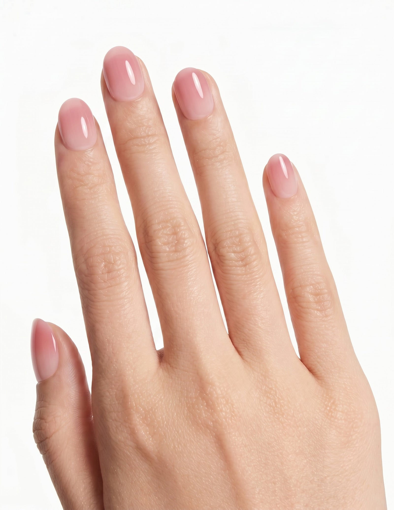 First Blush press-on nails — Oval (extra-short), light-skin hand, back of hand