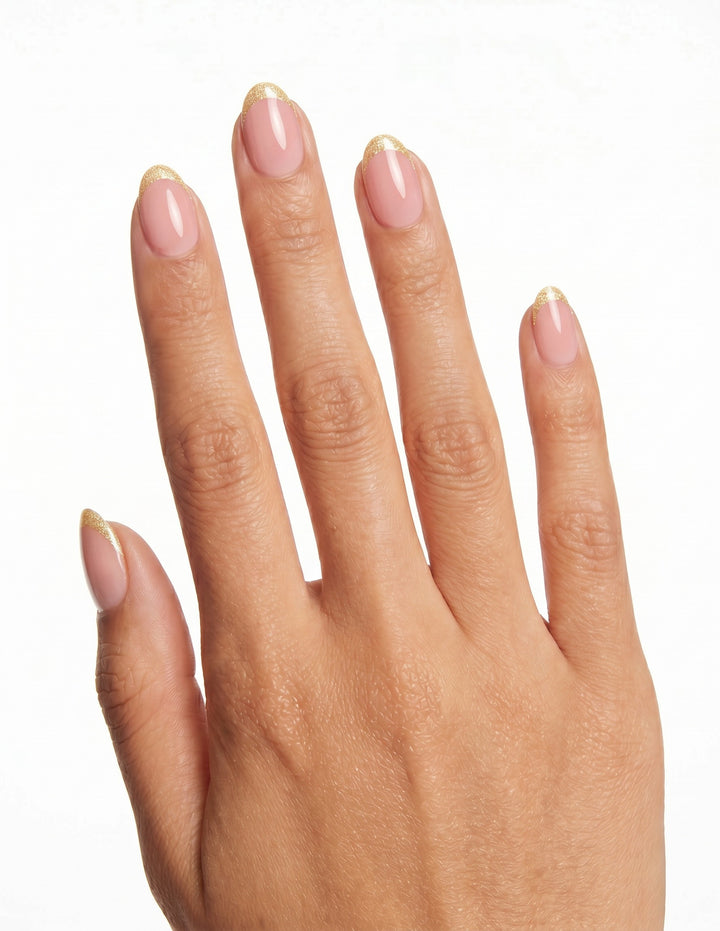Moonstone press-on nails — Almond (extra-short), tan hand, back of hand