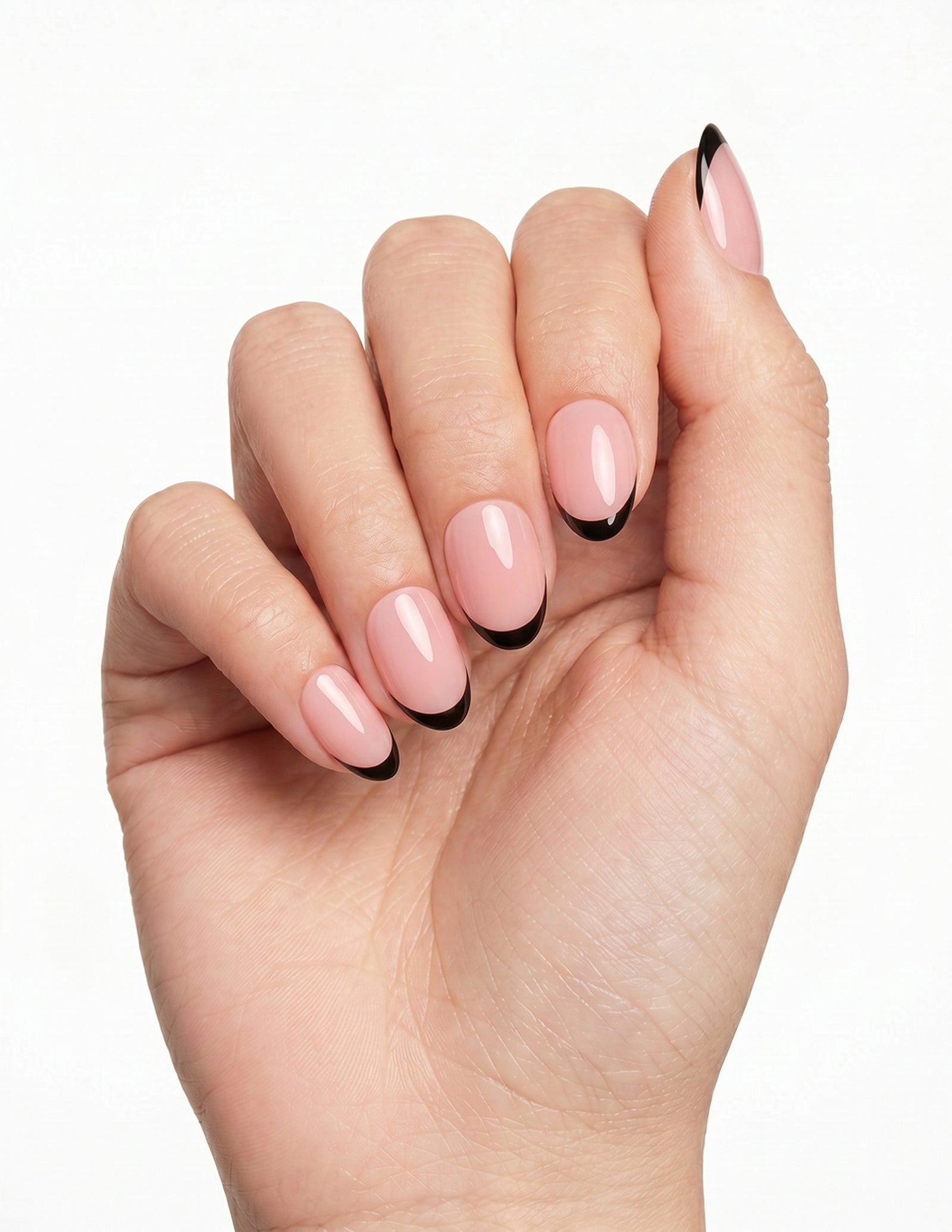After Hours press-on nails — Almond (extra-short), light-skin hand, fingers curled