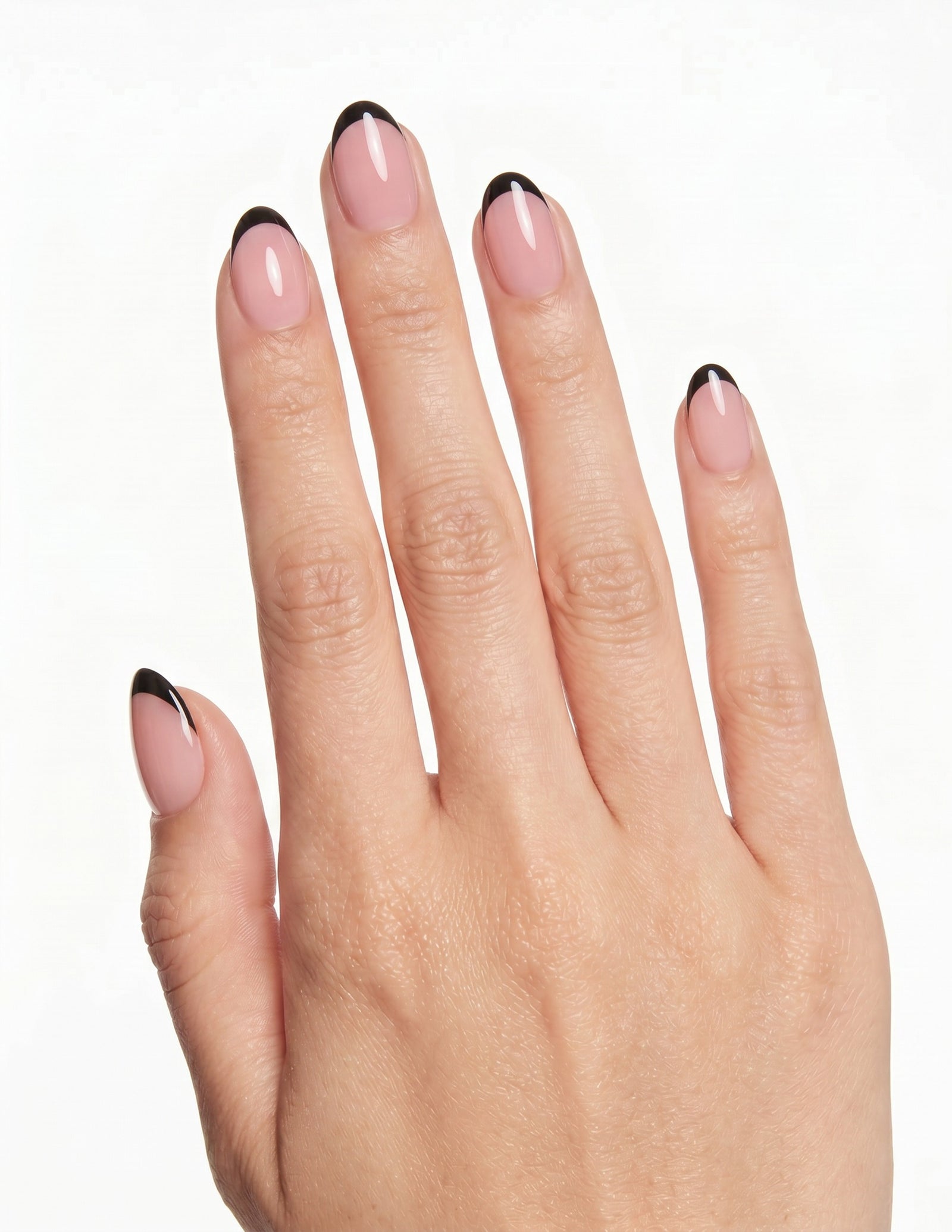 After Hours press-on nails — Almond (extra-short), light-skin hand, back of hand