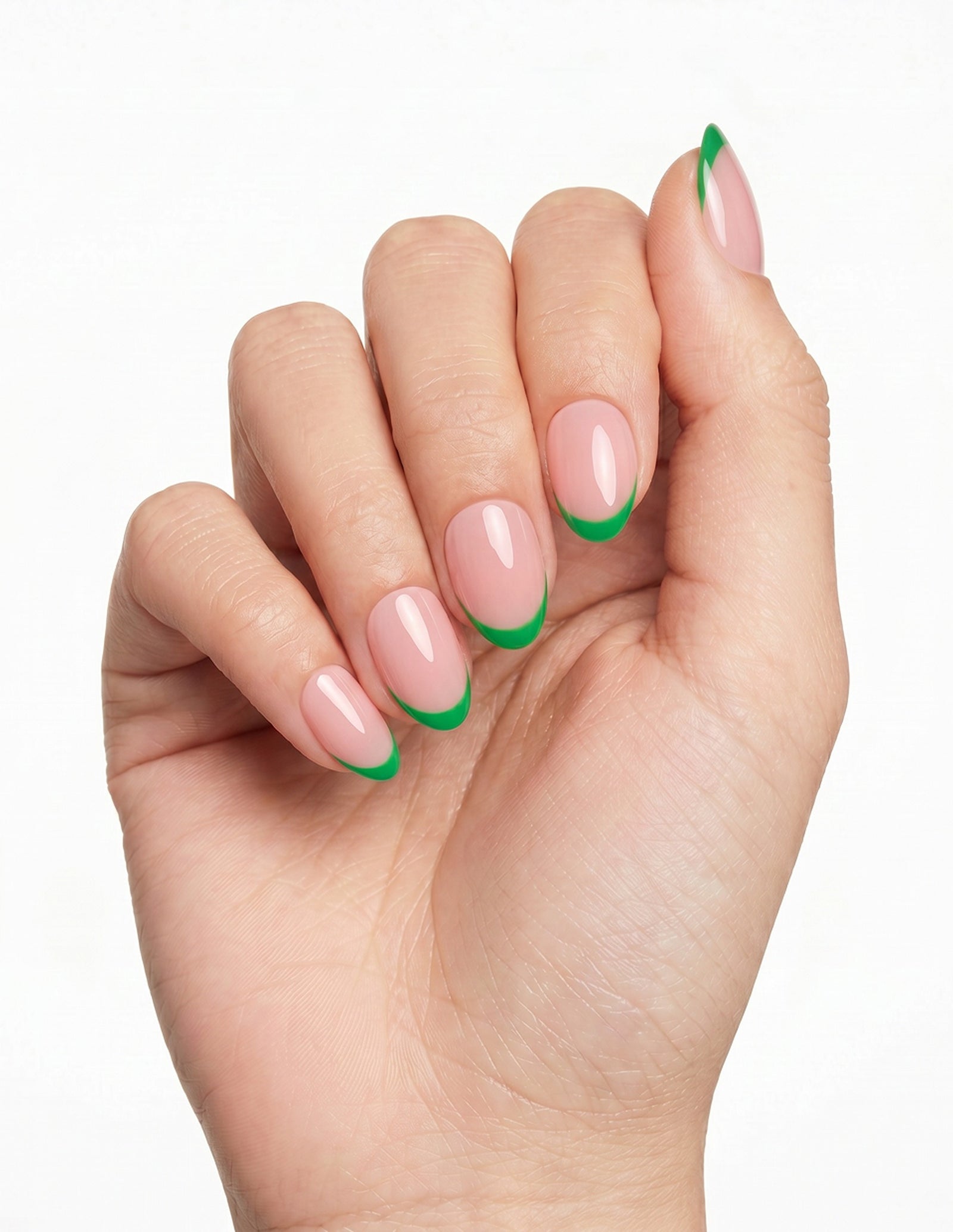 Lime Tips press-on nails — Almond (extra-short), light-skin hand, fingers curled