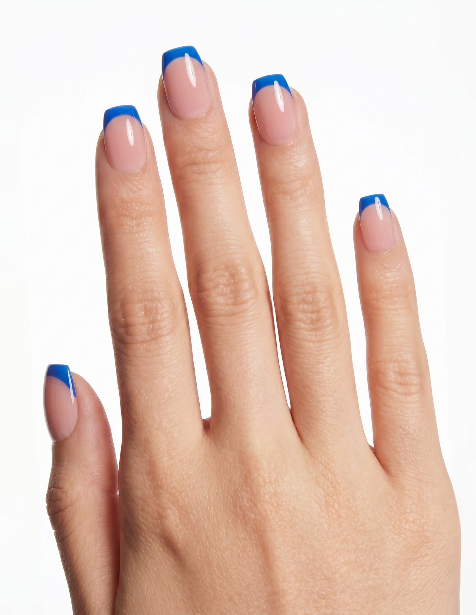 Cobalt Tips press-on nails — Coffin (short), deep-skin hand, back of hand