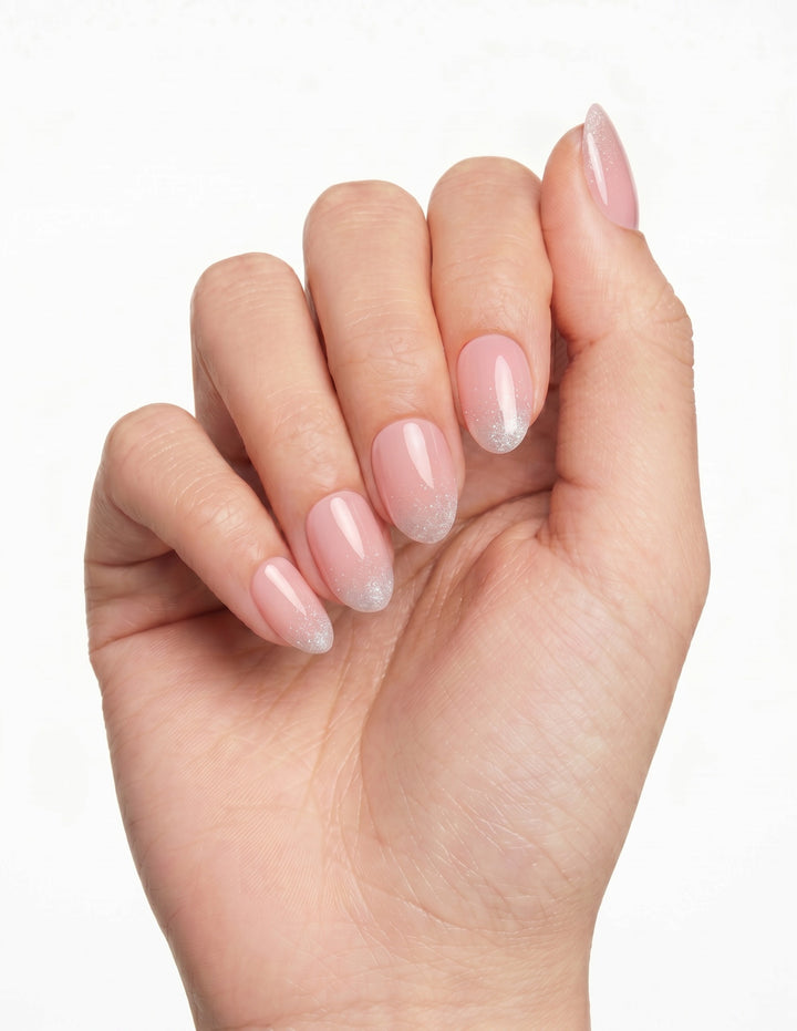 Prosecco press-on nails — Almond (extra-short), deep-skin hand, fingers curled