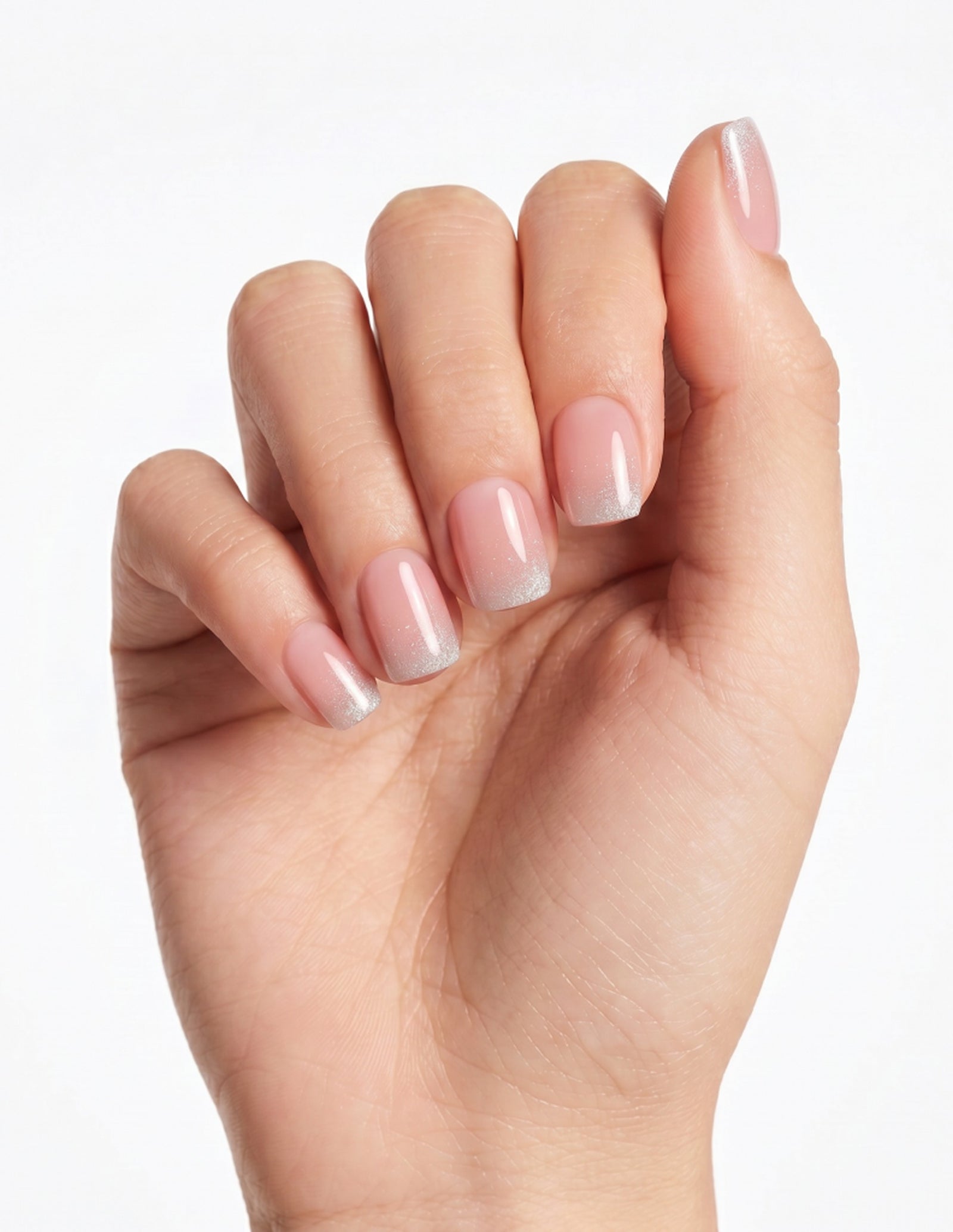 Prosecco press-on nails — Coffin (short), light-skin hand, fingers curled