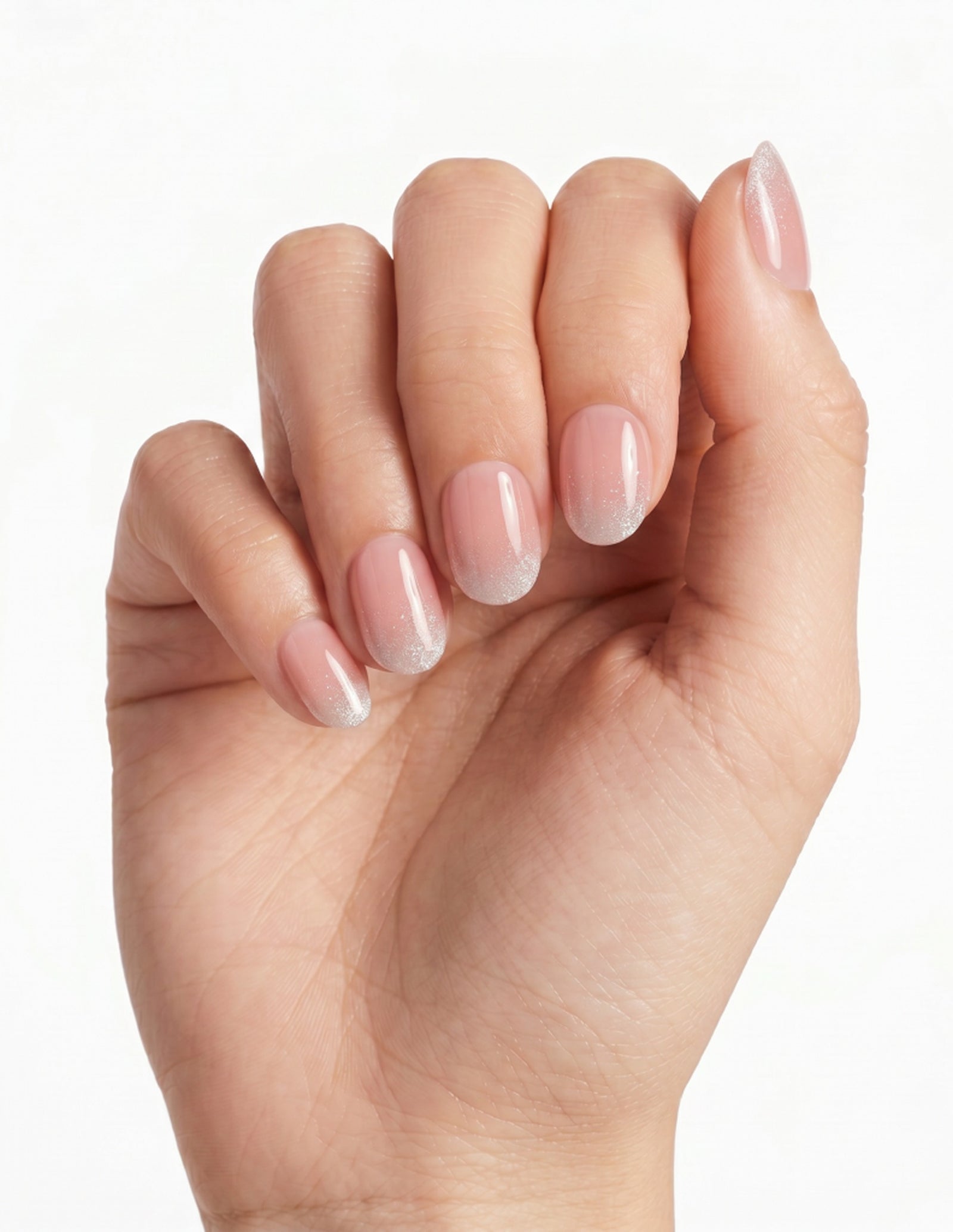 Prosecco press-on nails — Oval (extra-short), light-skin hand, fingers curled