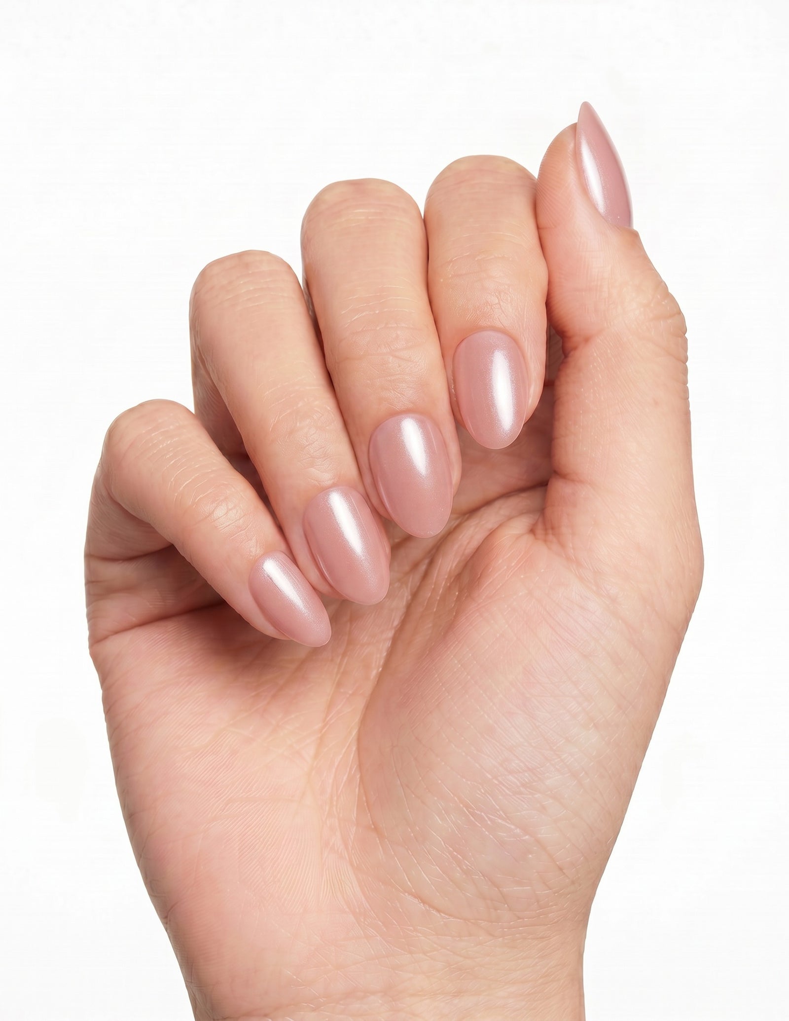 Bare Minimum press-on nails — Almond (extra-short), tan hand, fingers curled