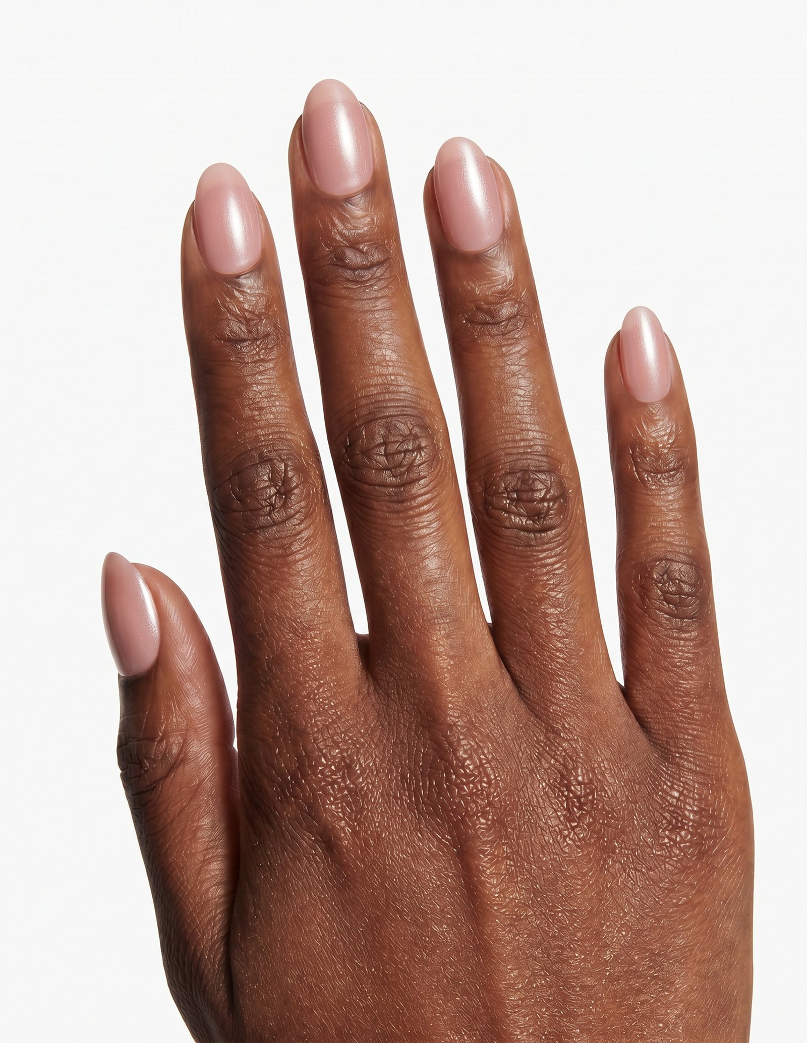 Bare Minimum press-on nails — Almond (extra-short), deep-skin hand, back of hand