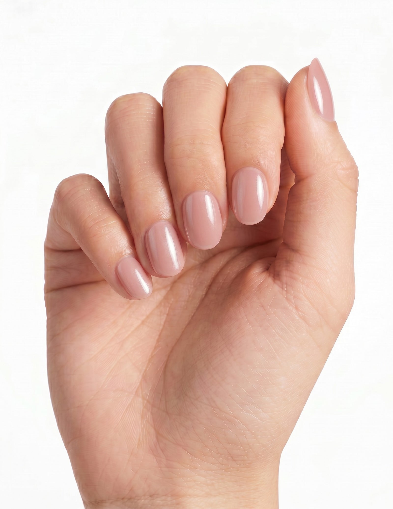 Bare Minimum press-on nails — Oval (extra-short), deep-skin hand, fingers curled