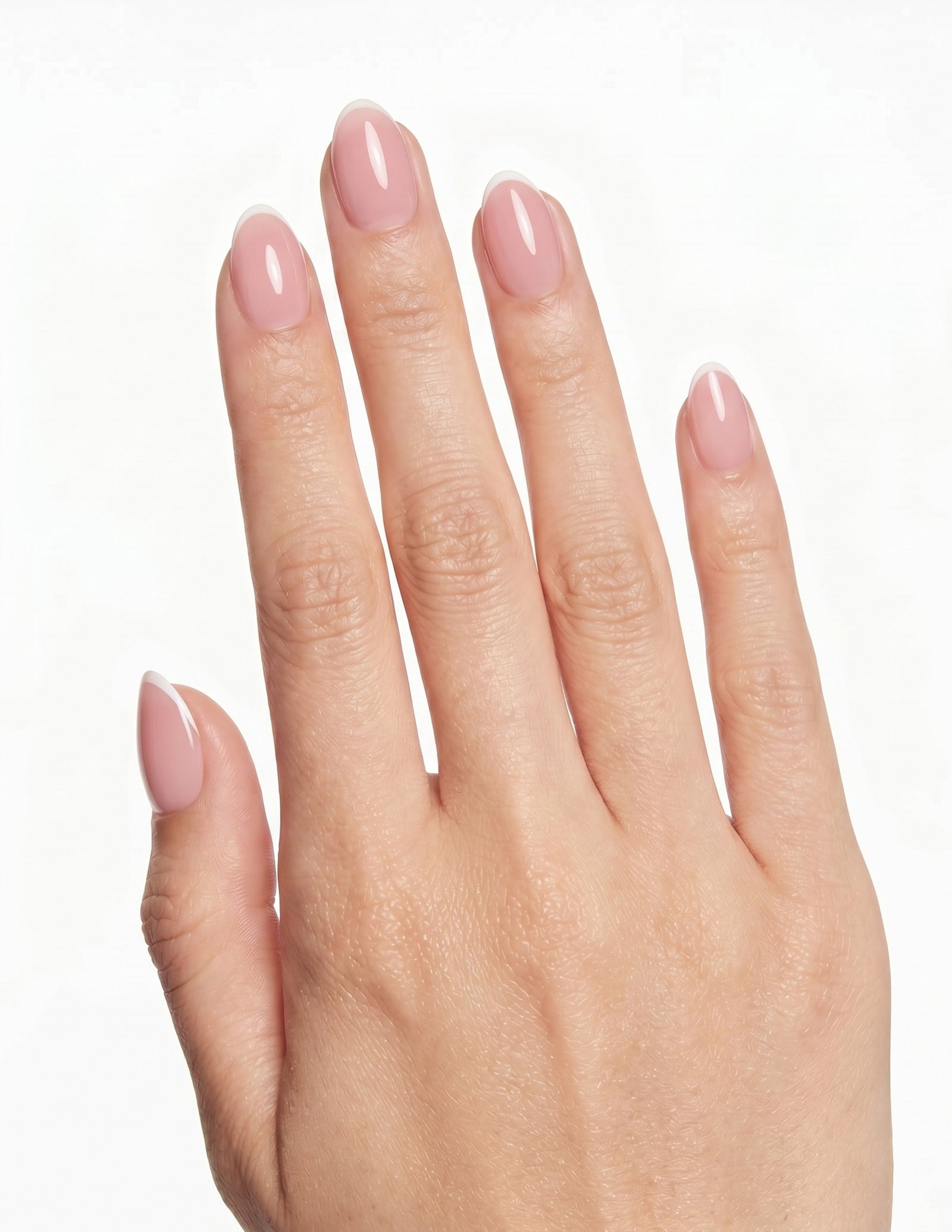 Micro French press-on nails — Almond (extra-short), light-skin hand, back of hand