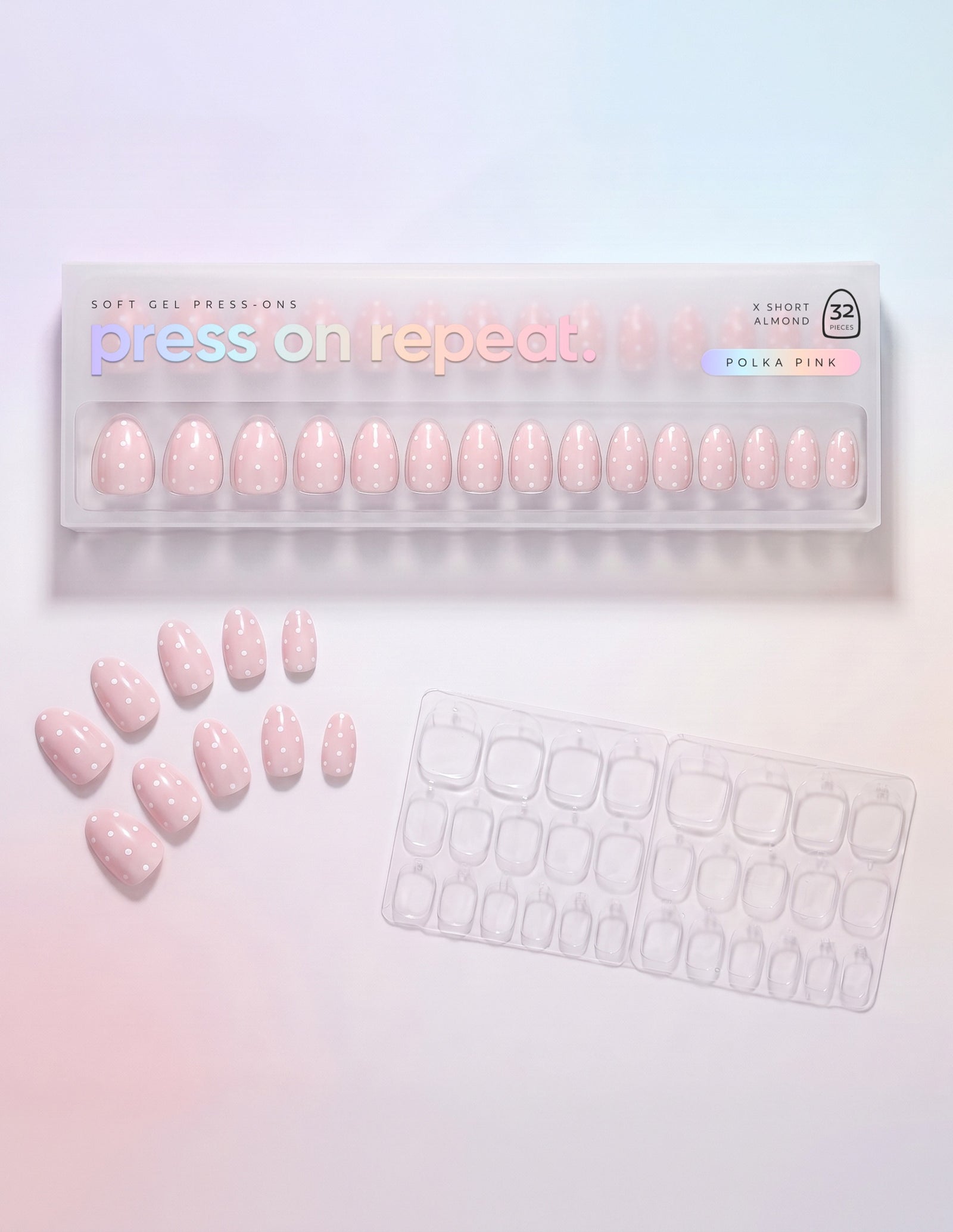 Polka Pink press-on nails — Almond (extra-short) retail box with loose nails and adhesive tabs