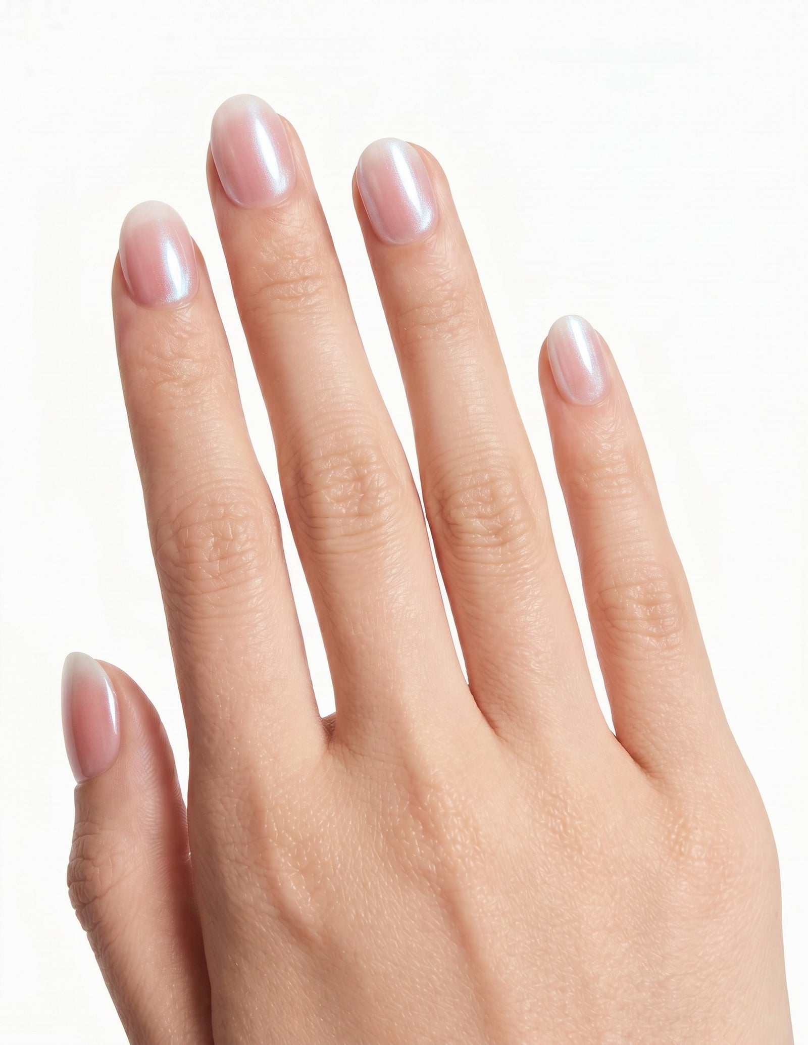 Pearl Slip press-on nails — Oval (extra-short), light-skin hand, back of hand