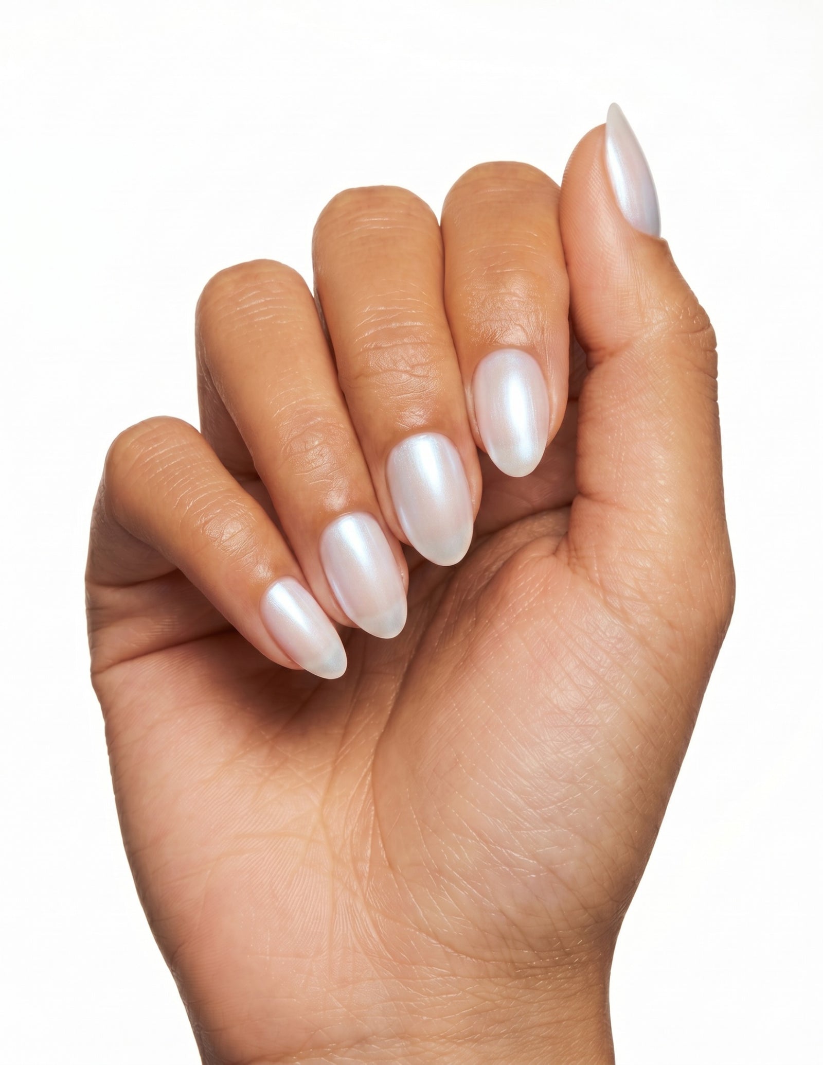 Glazed press-on nails — Almond (extra-short), tan hand, fingers curled