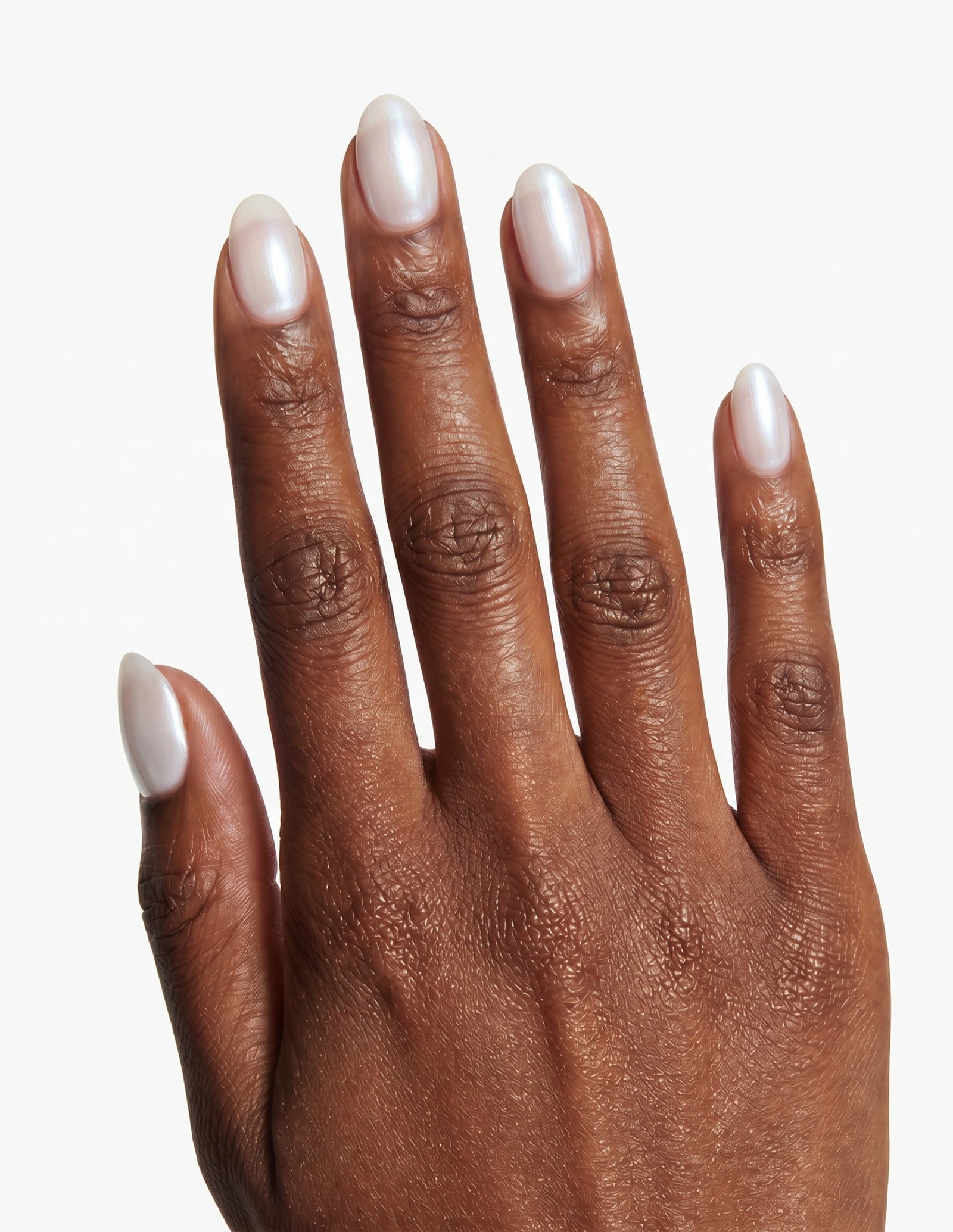 Glazed press-on nails — Almond (extra-short), deep-skin hand, back of hand