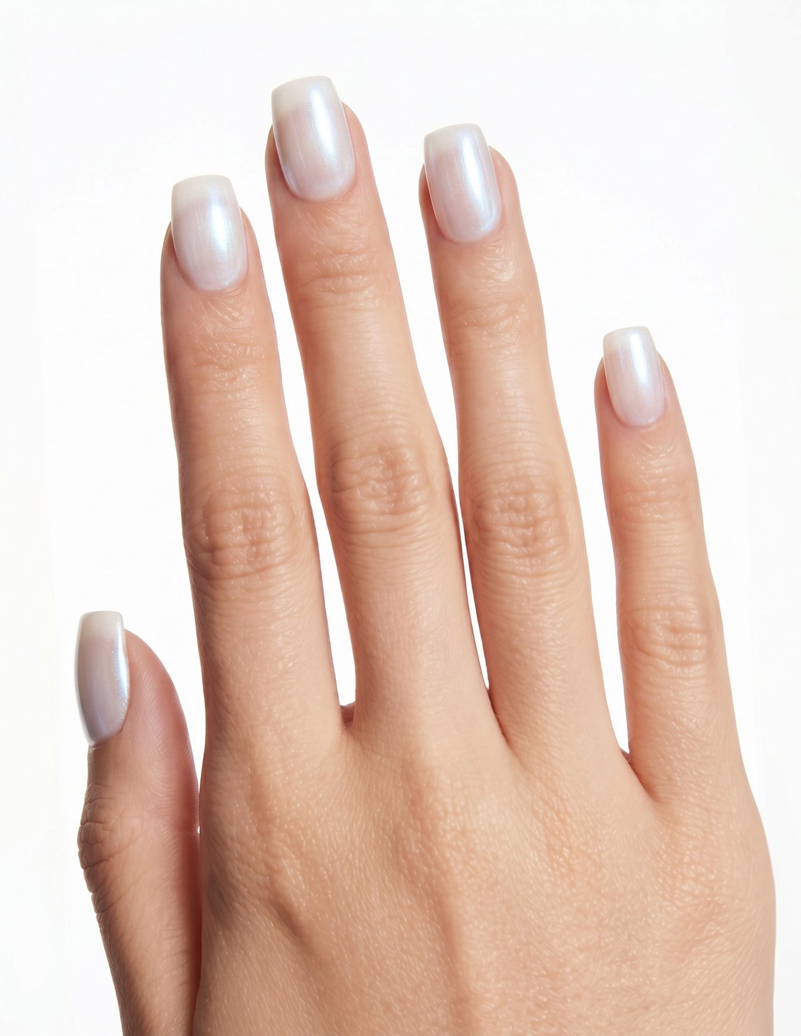 Glazed press-on nails — Coffin (short), tan hand, fingers curled