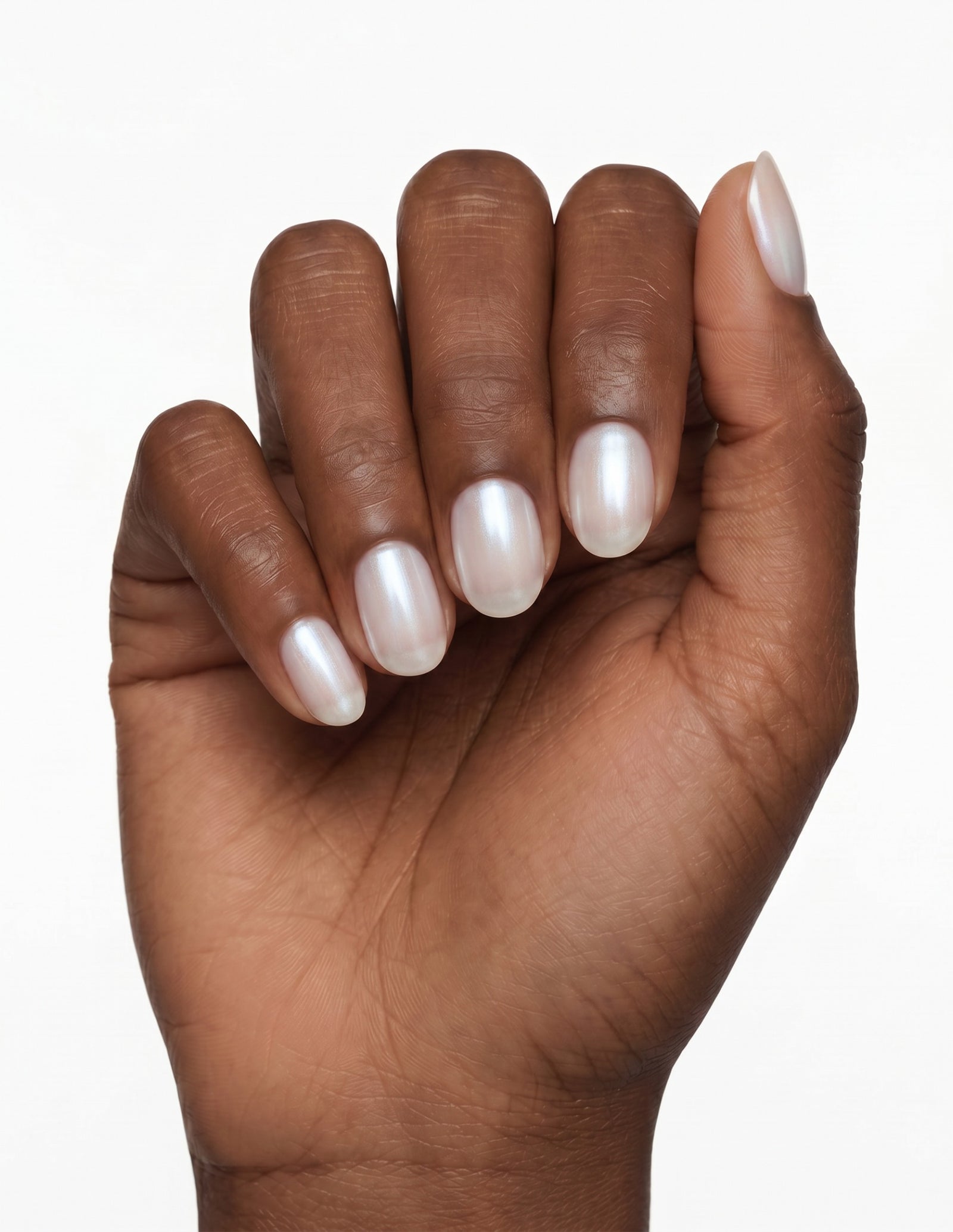 Glazed press-on nails — Oval (extra-short), deep-skin hand, fingers curled