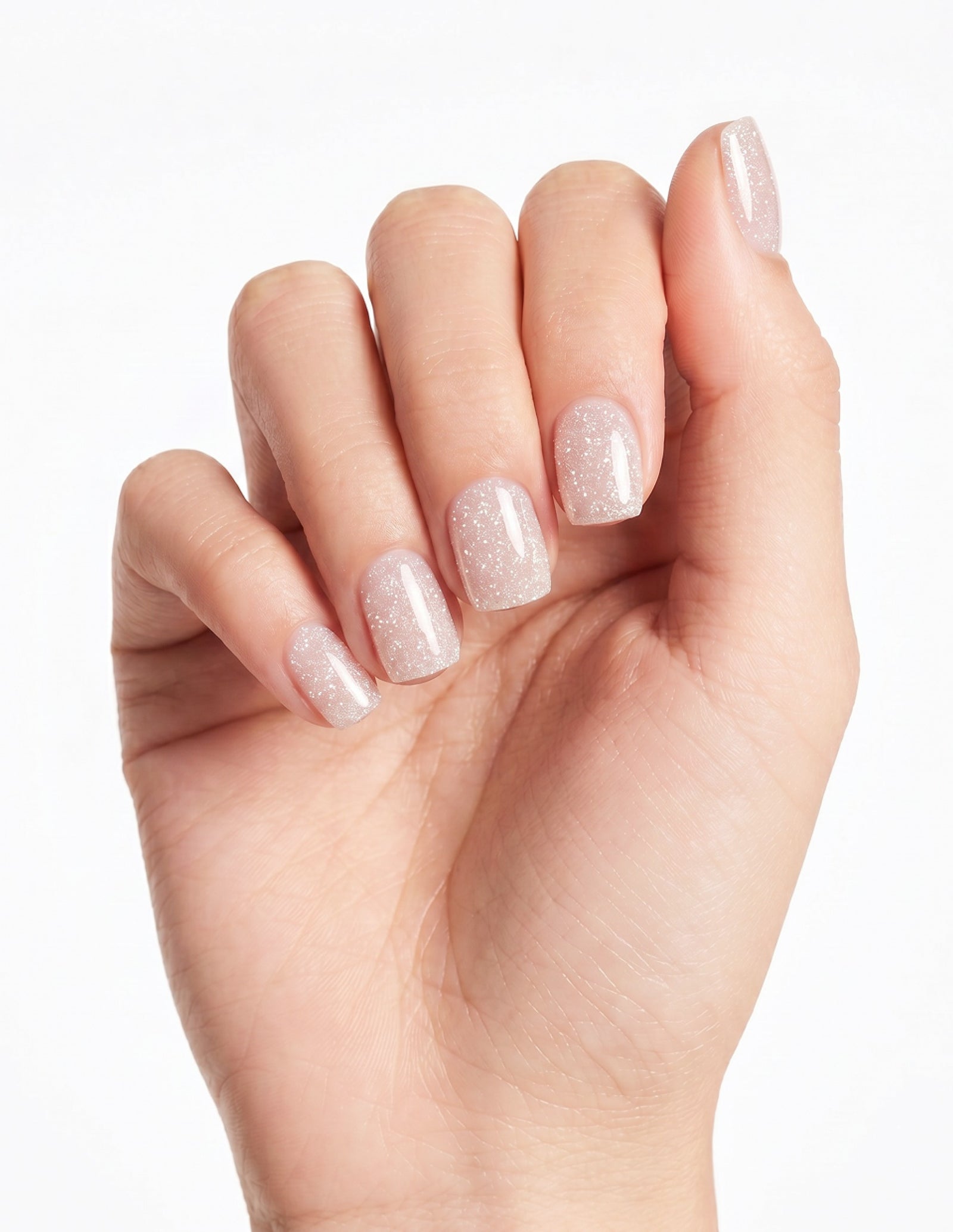 Disco Velvet press-on nails — Coffin (short), light-skin hand, fingers curled