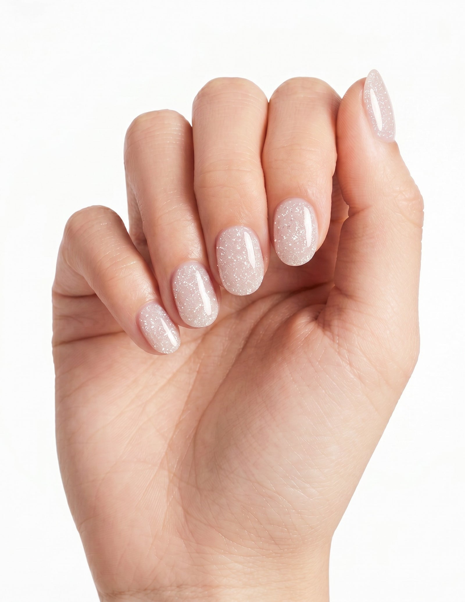 Disco Velvet press-on nails — Oval (extra-short), light-skin hand, fingers curled