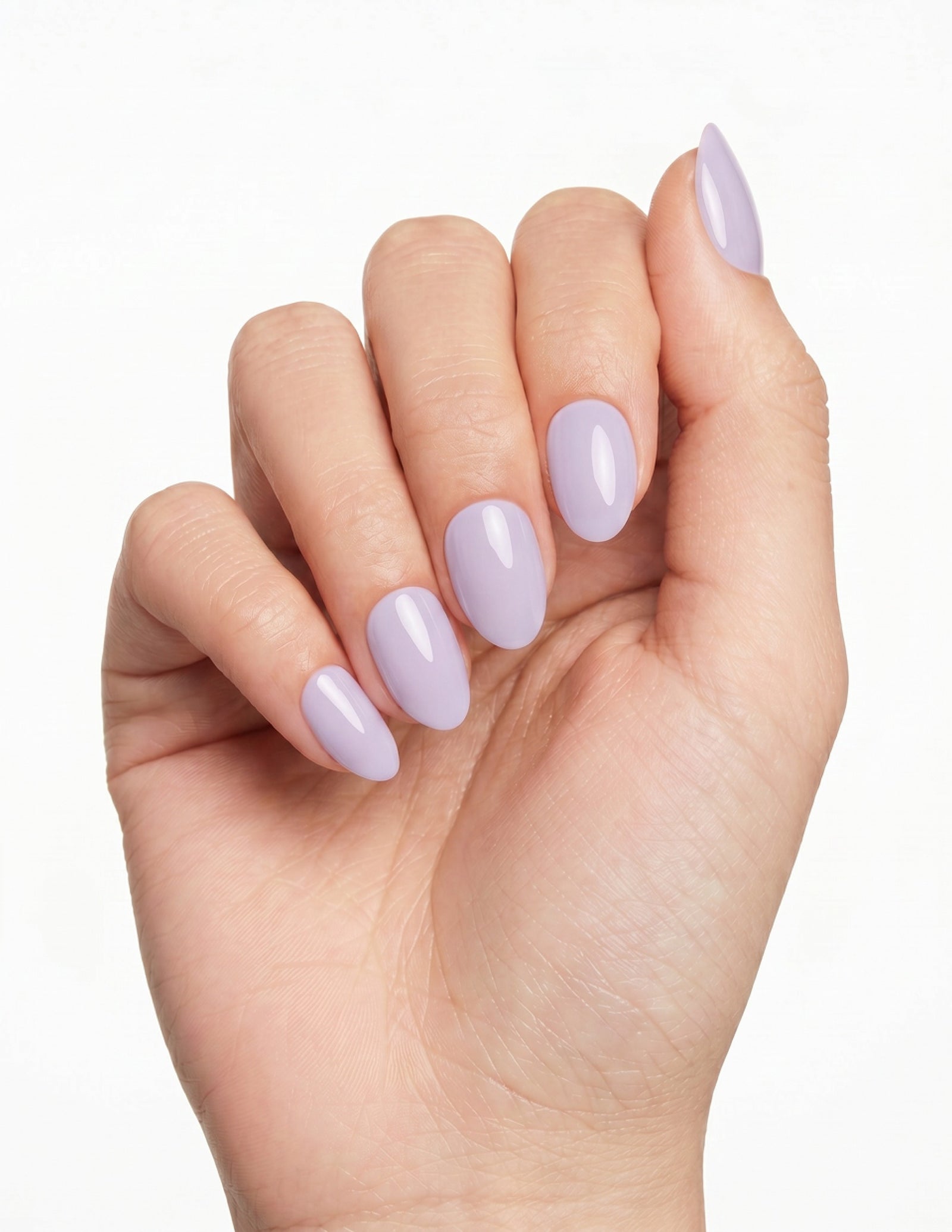 Lilac press-on nails — Almond (extra-short), light-skin hand, fingers curled