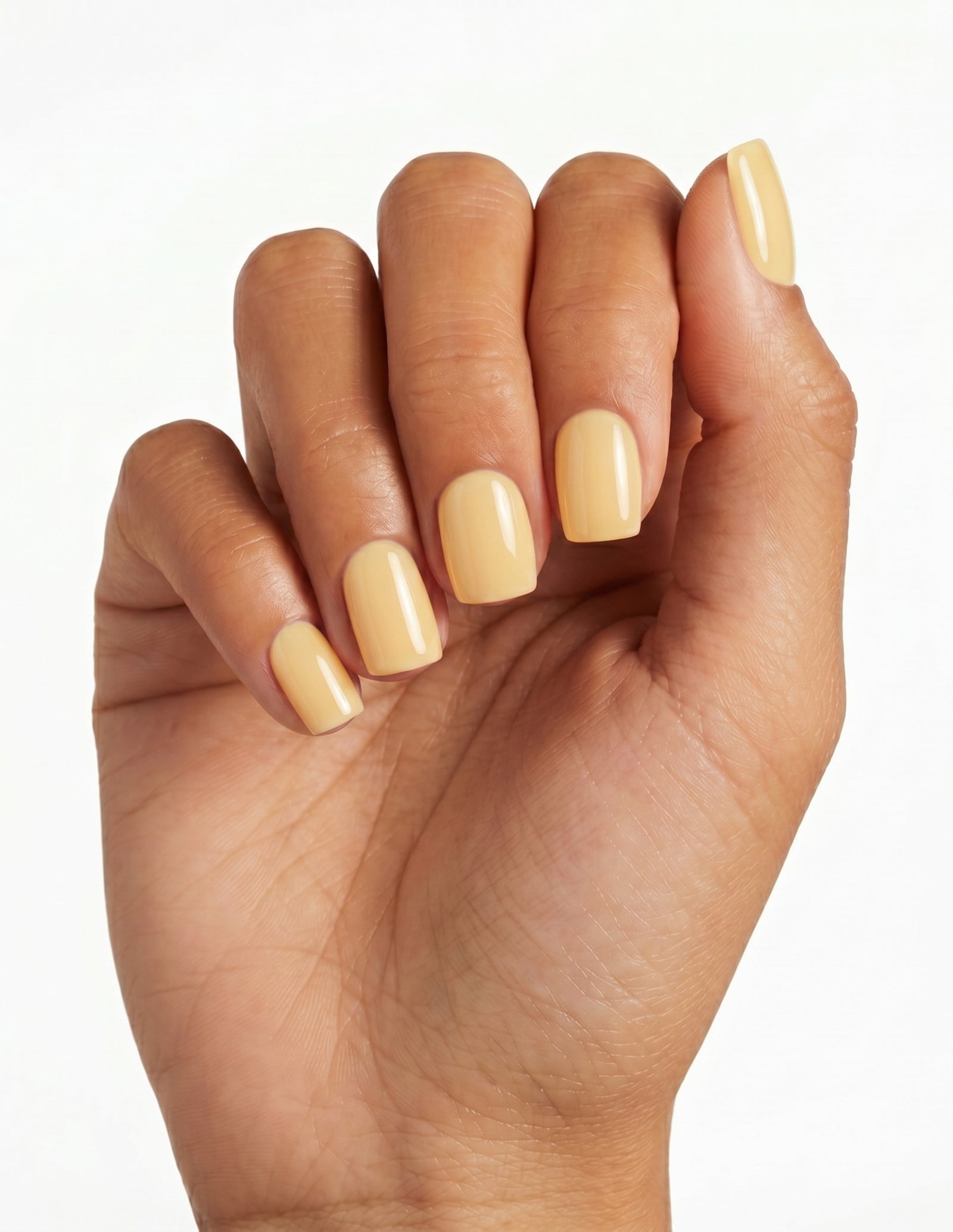 Butter press-on nails — Coffin (short), deep-skin hand, back of hand