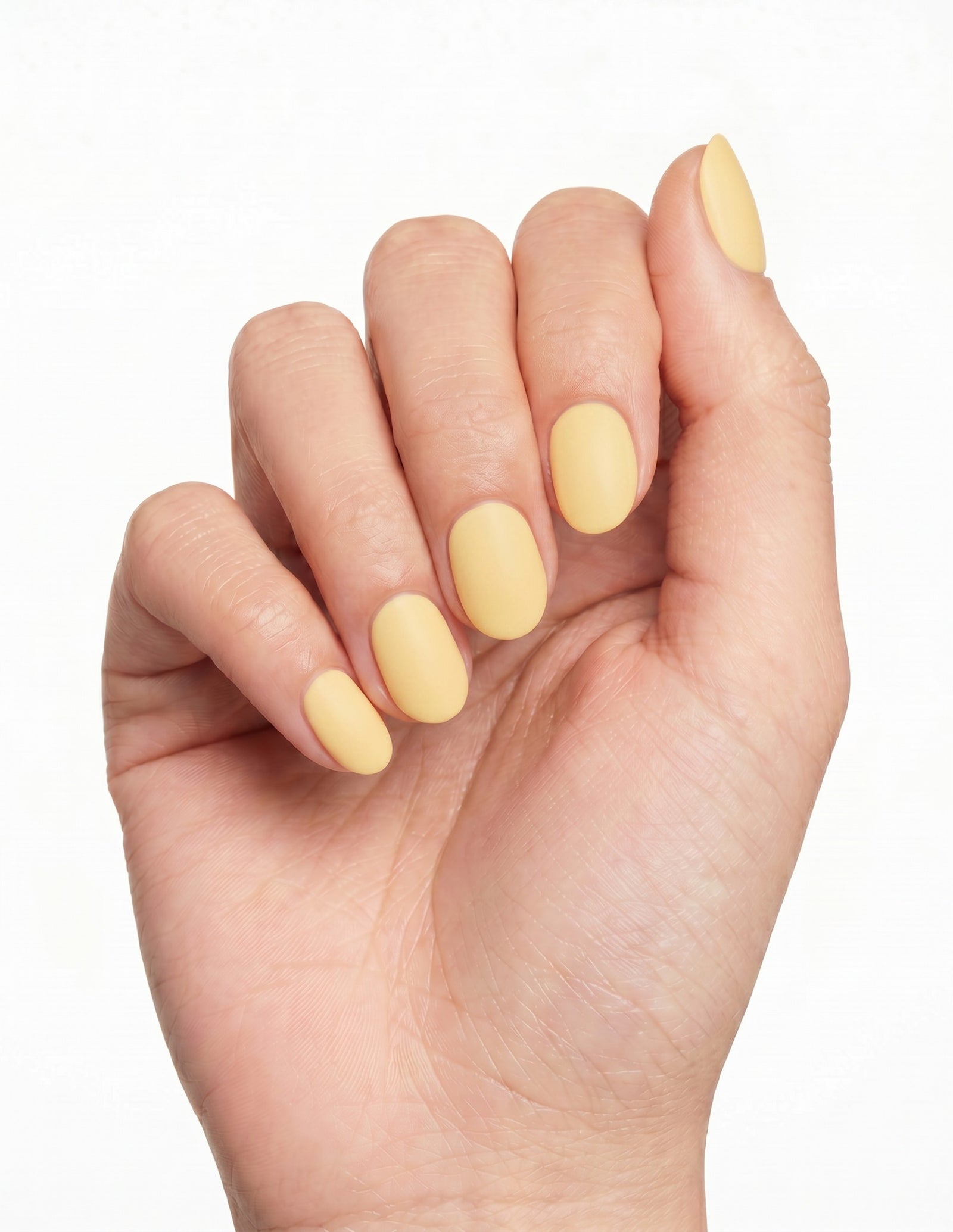 Butter press-on nails — Oval (extra-short), deep-skin hand, fingers curled