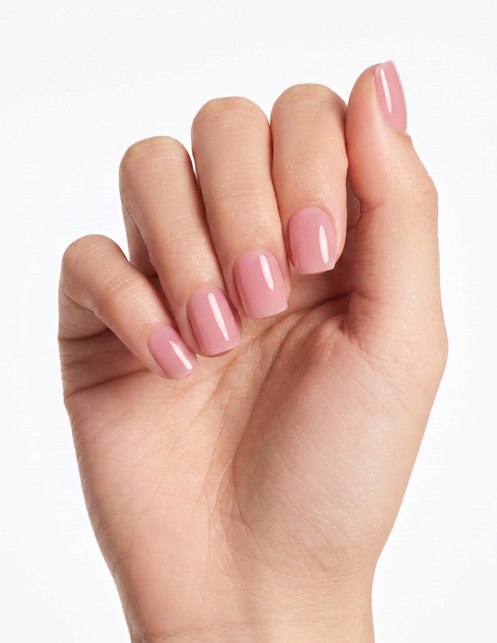 Bubblegum press-on nails — Coffin (short), light-skin hand, fingers curled