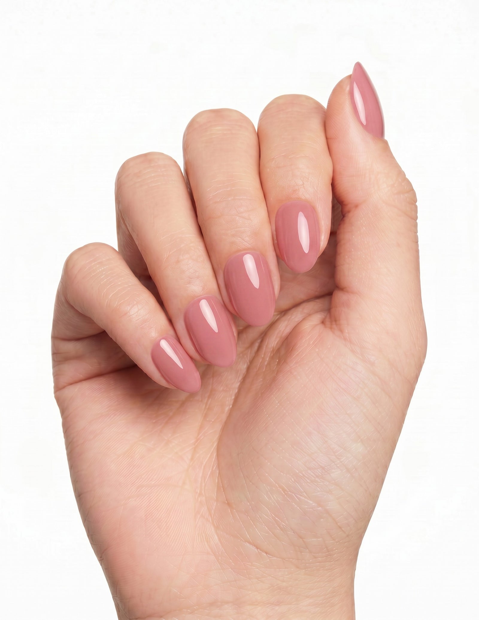 Bubblegum press-on nails — Oval (extra-short), deep-skin hand, fingers curled