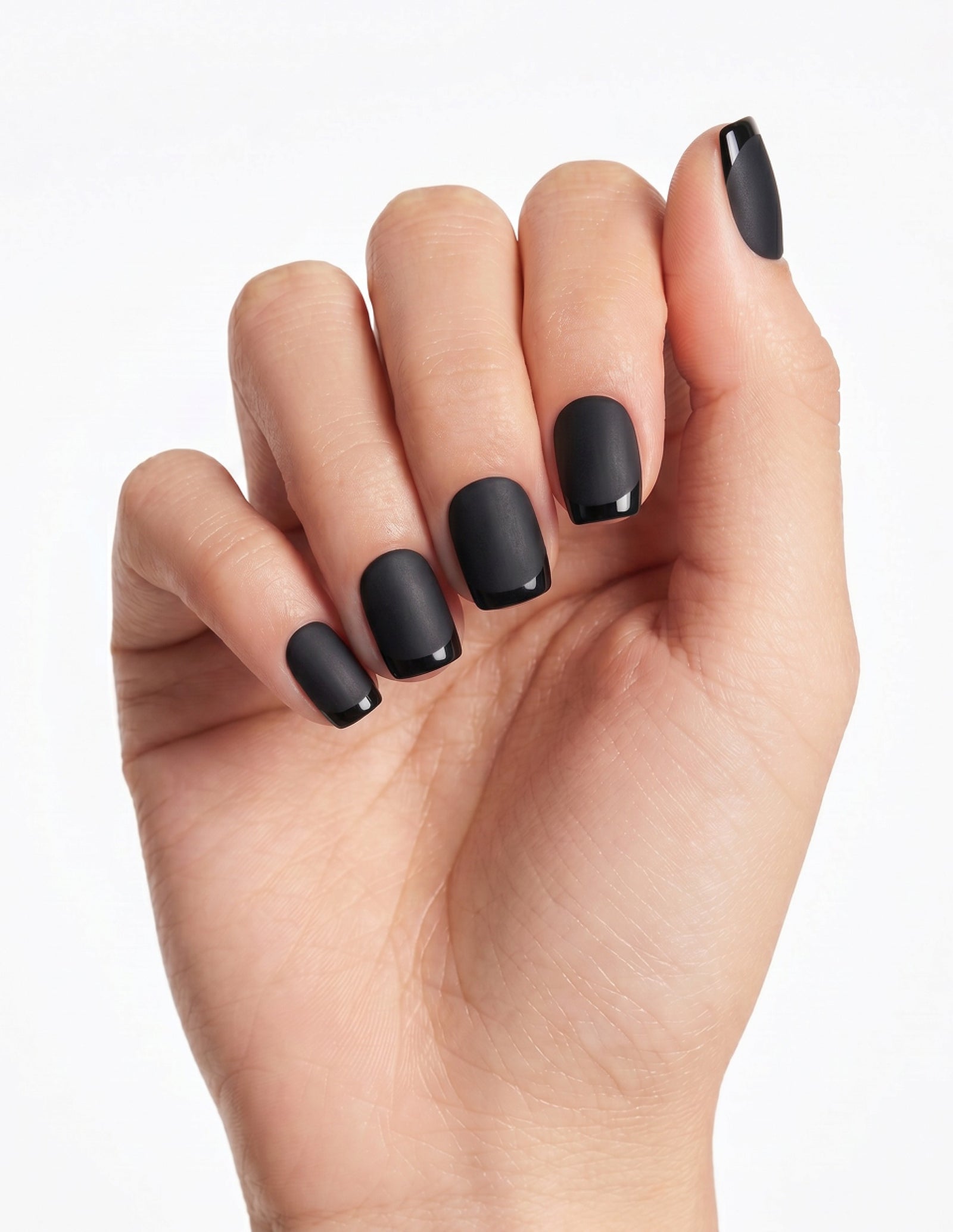 Ink press-on nails — Coffin (short), light-skin hand, fingers curled