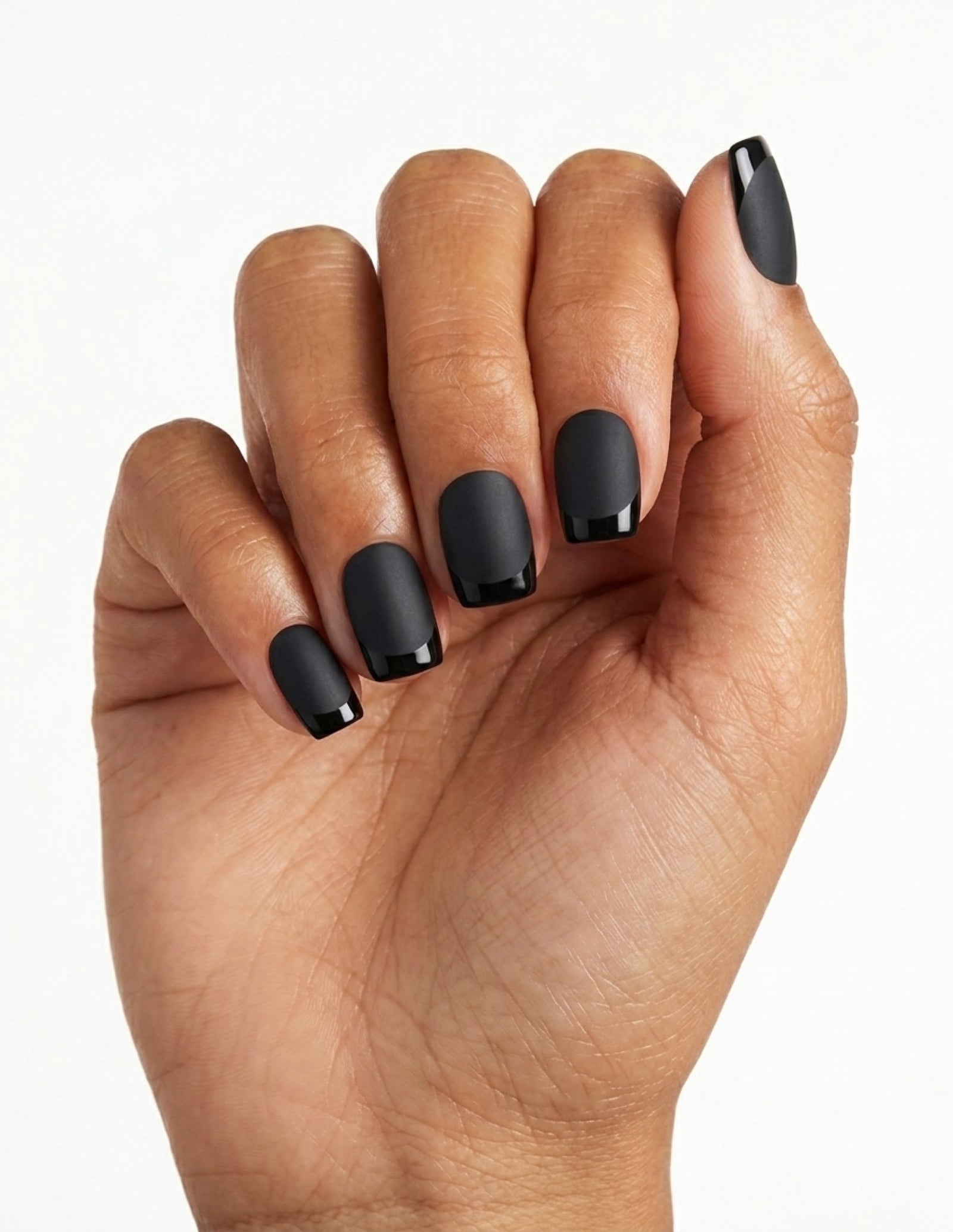 Ink press-on nails — Coffin (short), tan hand, fingers curled