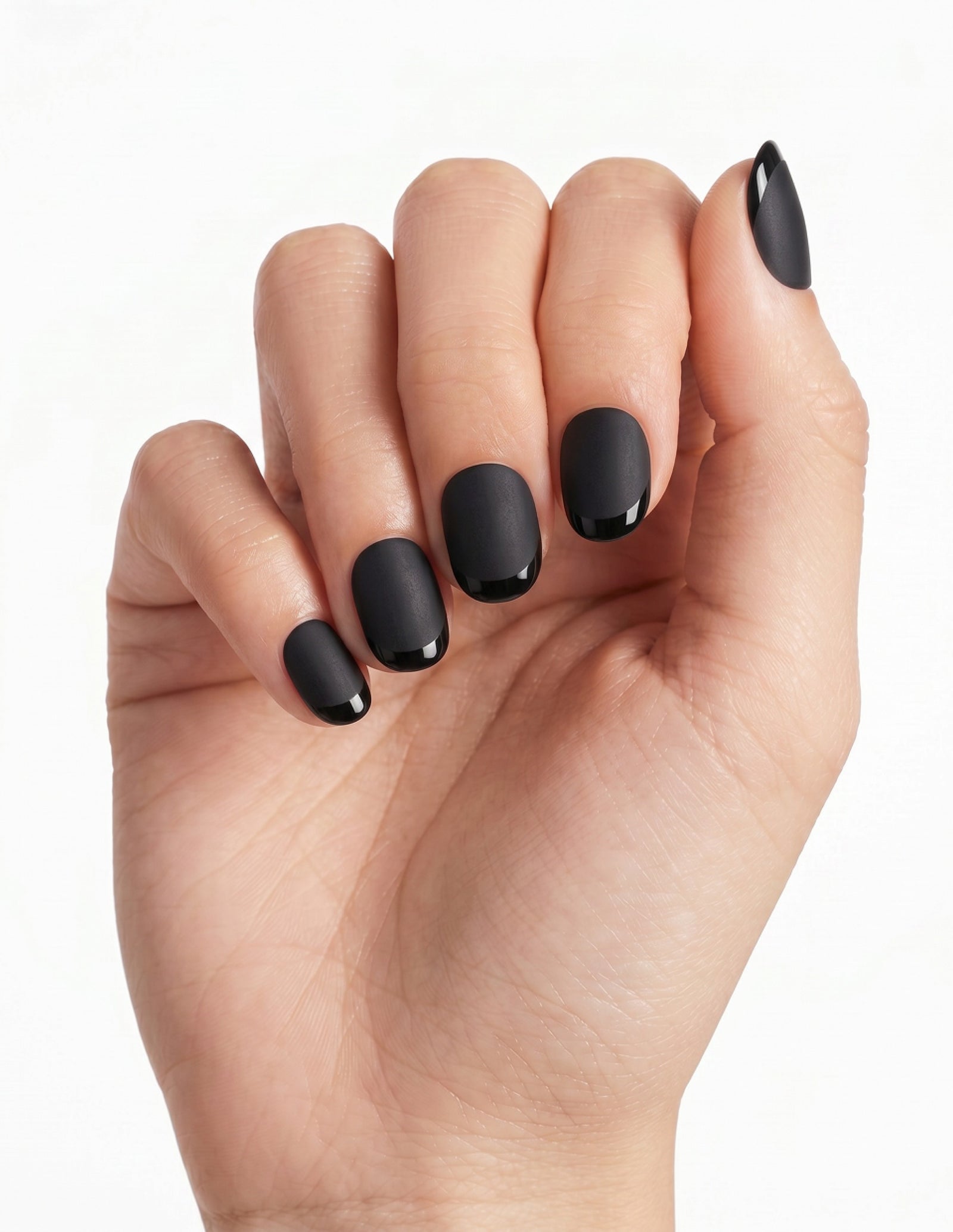 Ink press-on nails — Oval (extra-short), light-skin hand, fingers curled