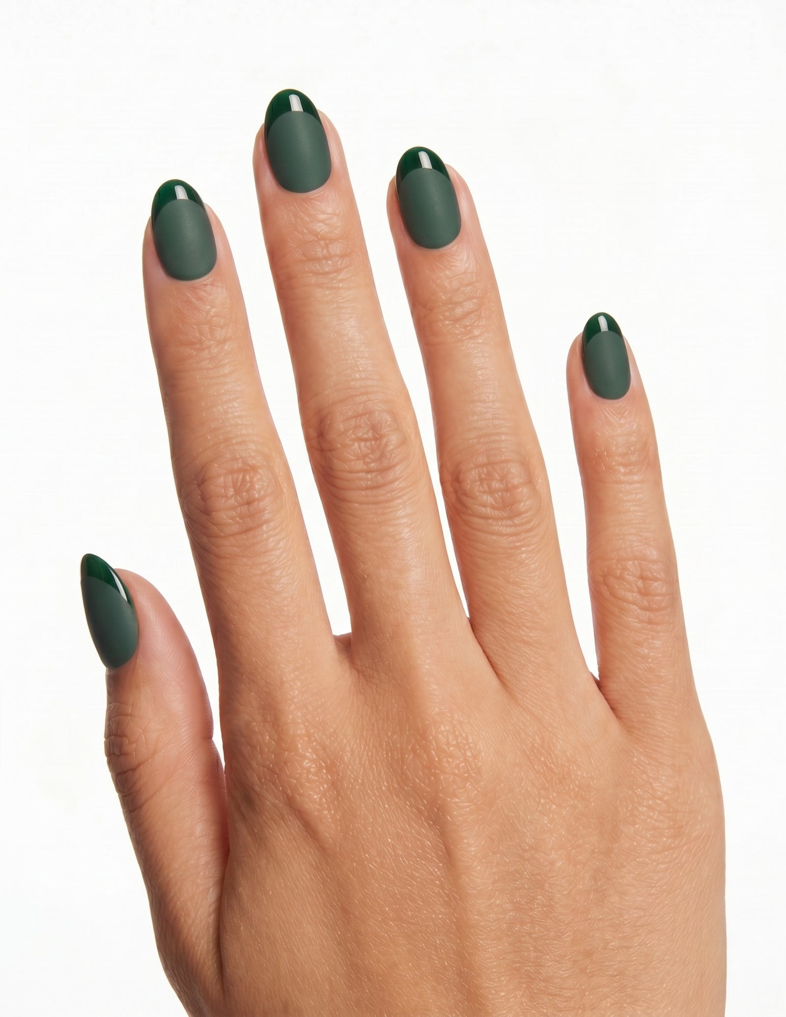 Forest press-on nails — Almond (extra-short), tan hand, back of hand