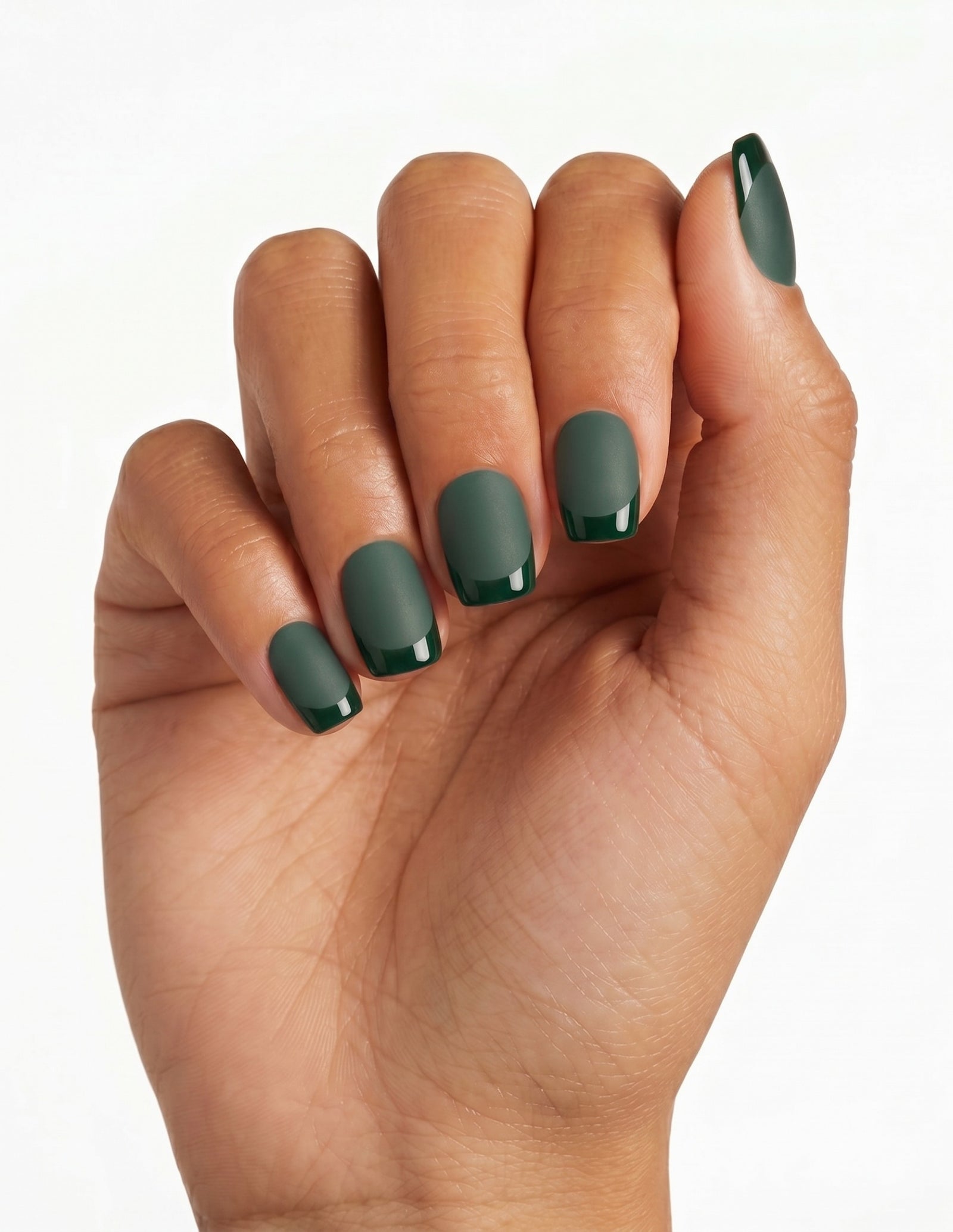 Forest press-on nails — Coffin (short), tan hand, fingers curled