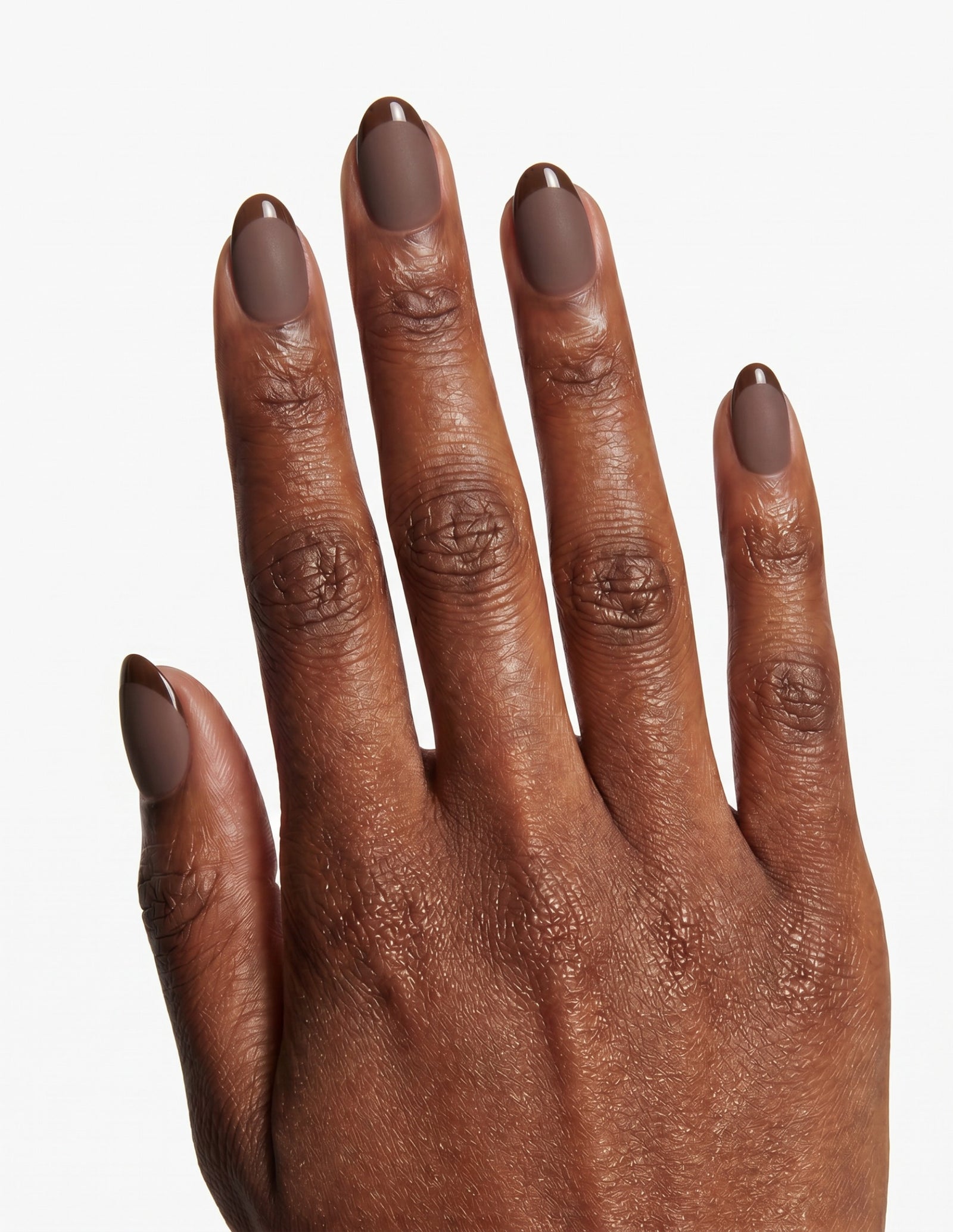 Cocoa press-on nails — Almond (extra-short), deep-skin hand, back of hand