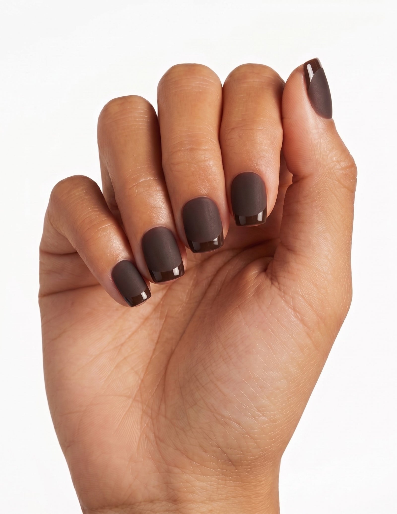 Cocoa press-on nails — Coffin (short), tan hand, fingers curled