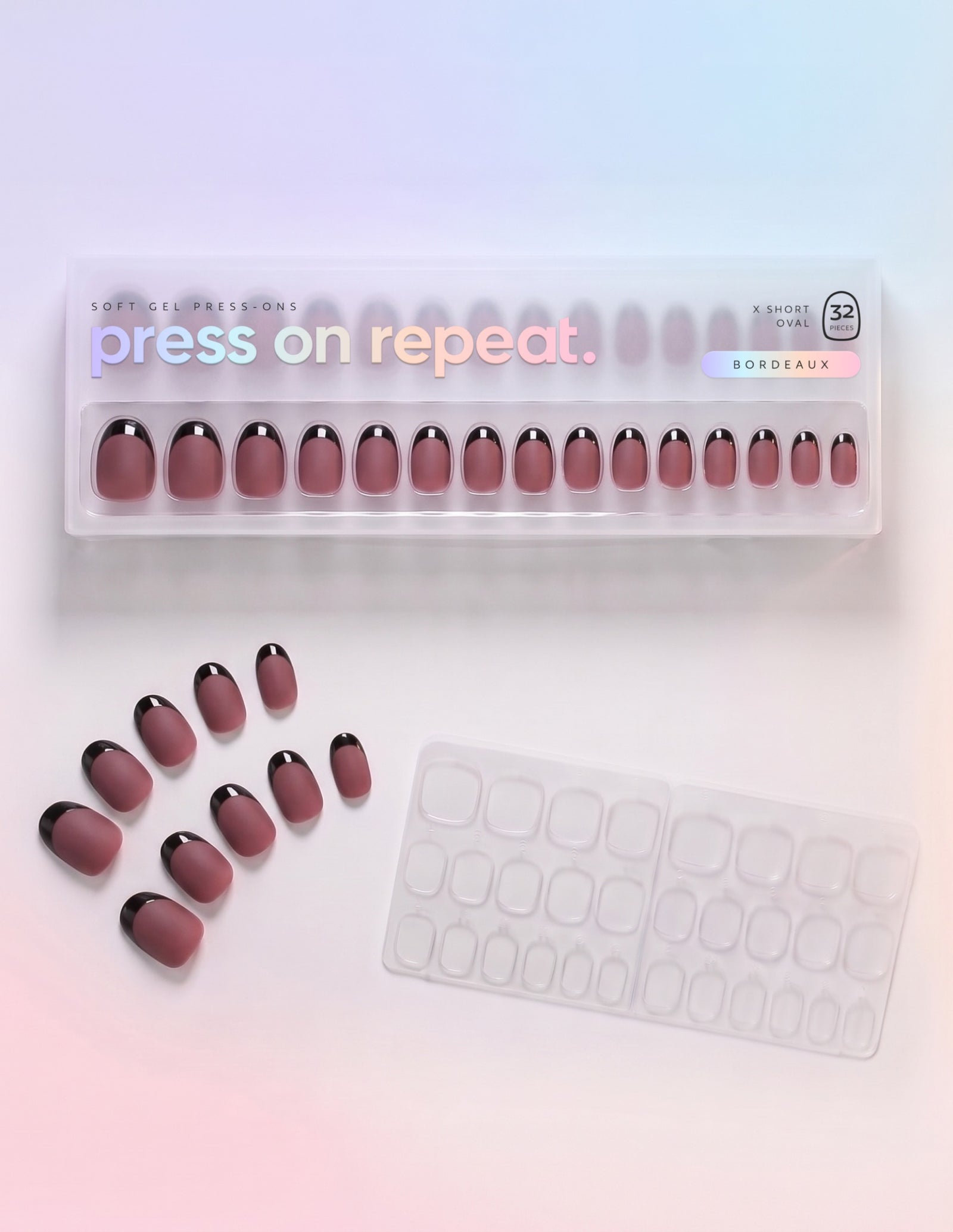 Bordeaux press-on nails — Oval (extra-short) retail box with loose nails and adhesive tabs