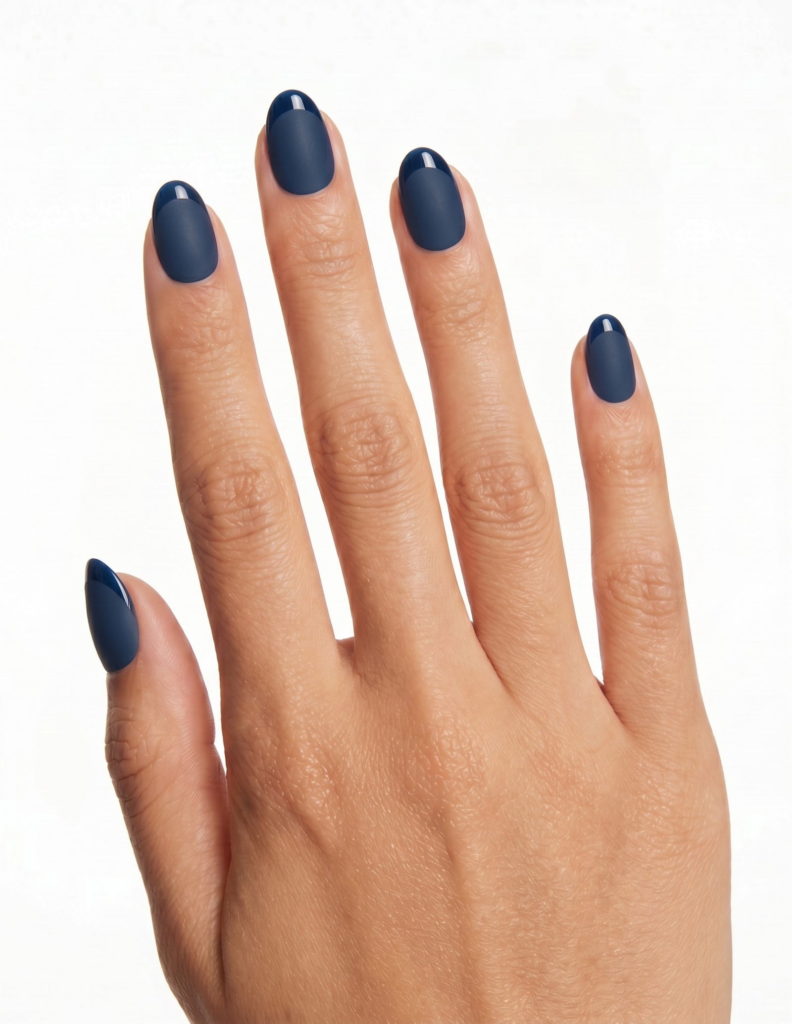 Midnight press-on nails — Almond (extra-short), tan hand, back of hand