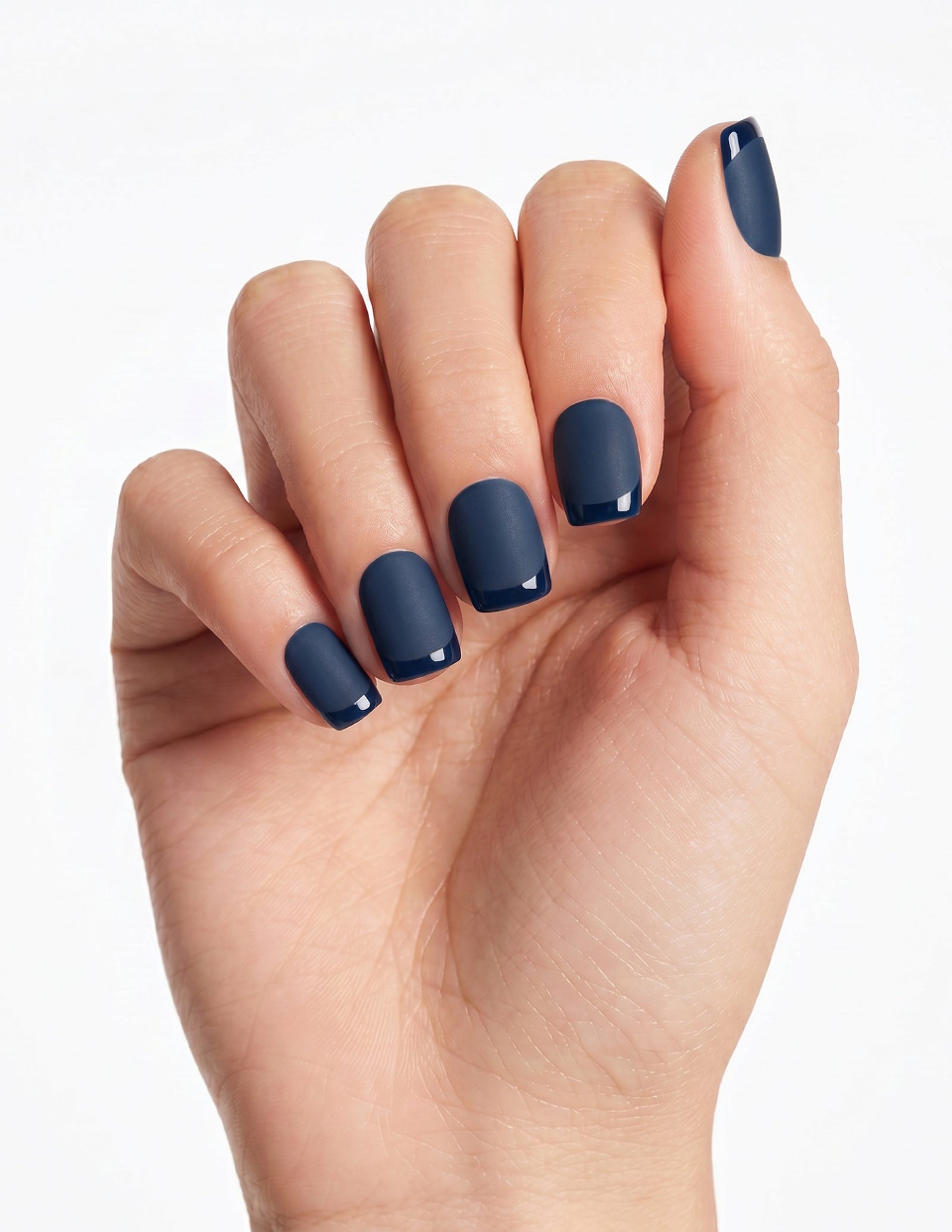 Midnight press-on nails — Coffin (short), light-skin hand, fingers curled
