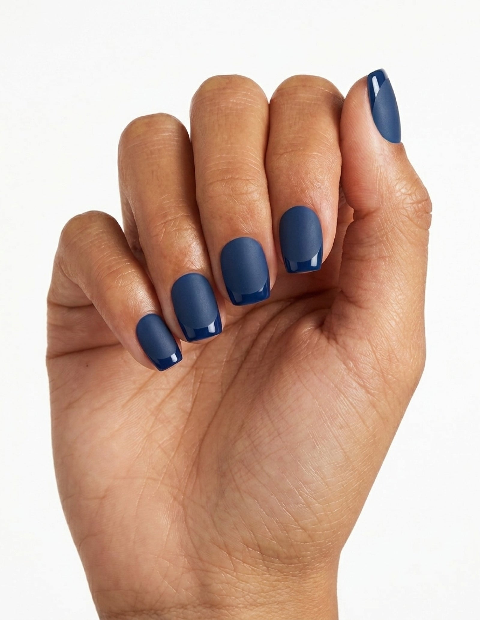Midnight press-on nails — Coffin (short), tan hand, fingers curled