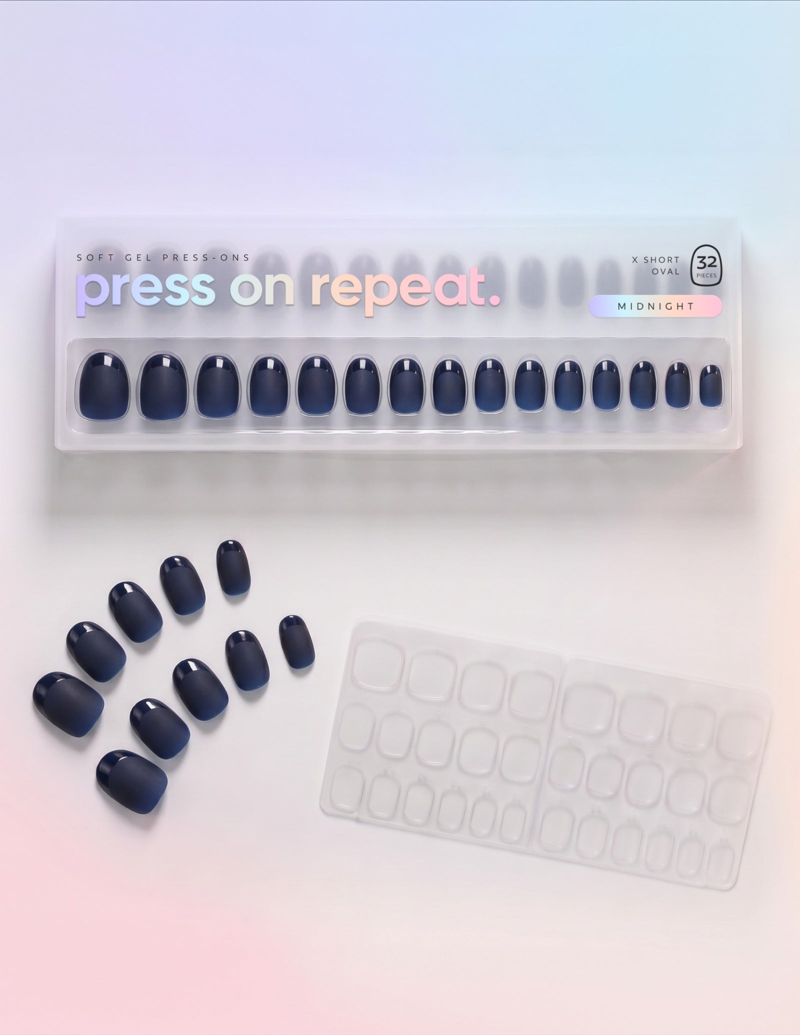 Midnight press-on nails — Oval (extra-short) retail box with loose nails and adhesive tabs