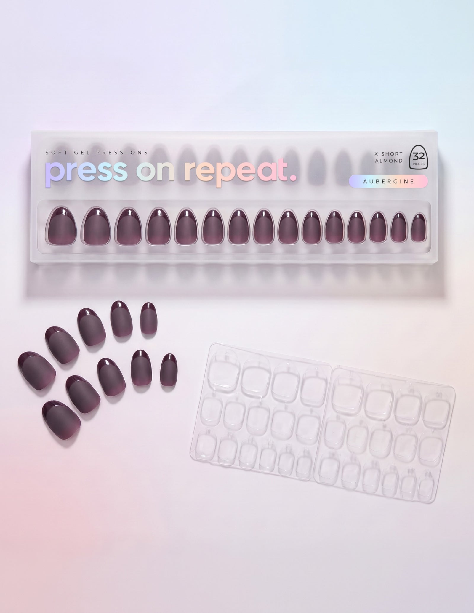 Aubergine press-on nails — Almond (extra-short) retail box with loose nails and adhesive tabs