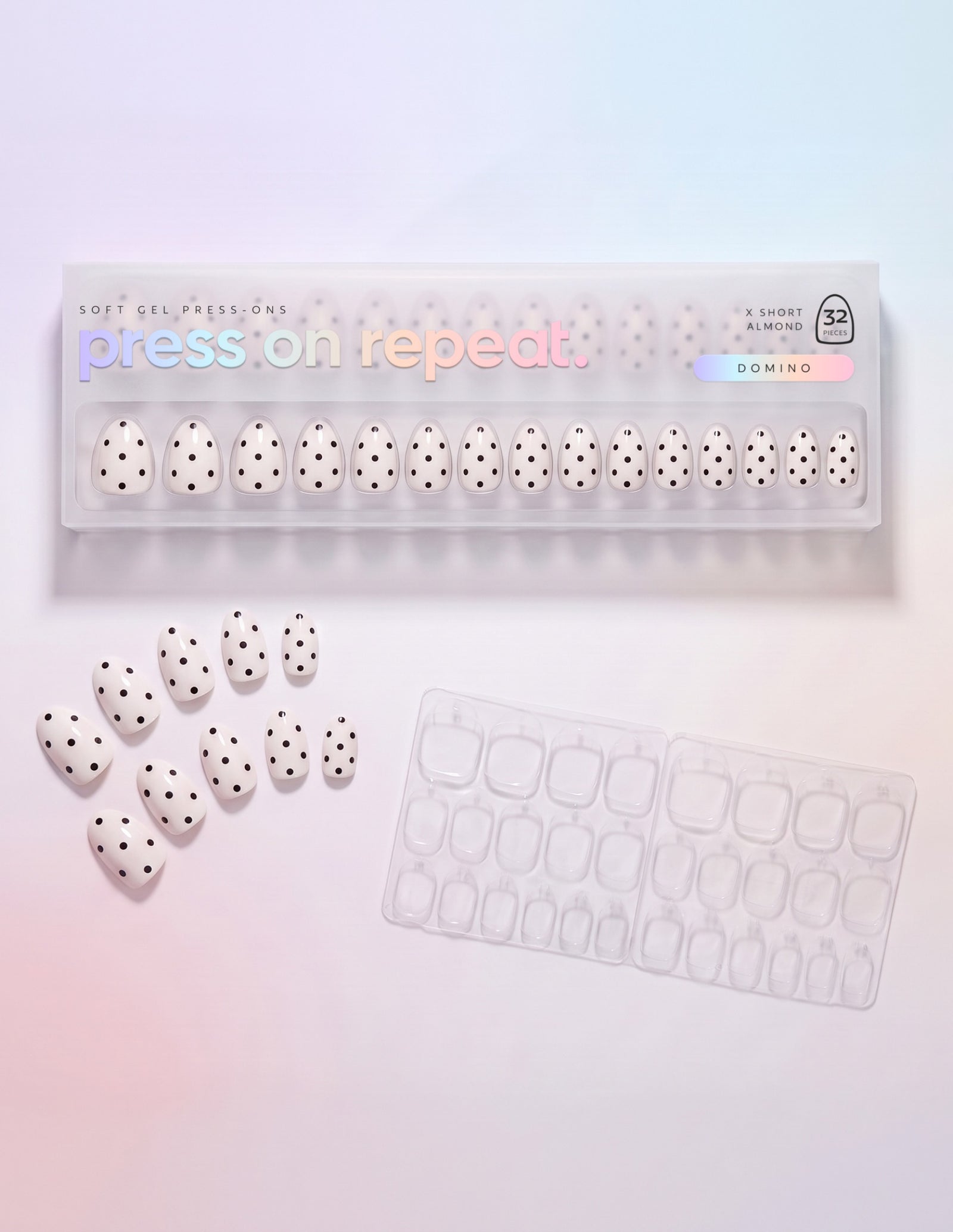 Domino press-on nails — Almond (extra-short) retail box with loose nails and adhesive tabs