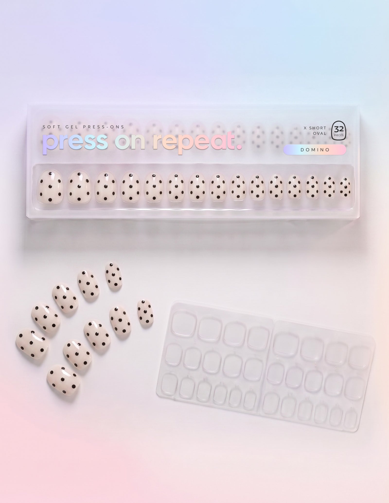 Domino press-on nails — Oval (extra-short) retail box with loose nails and adhesive tabs