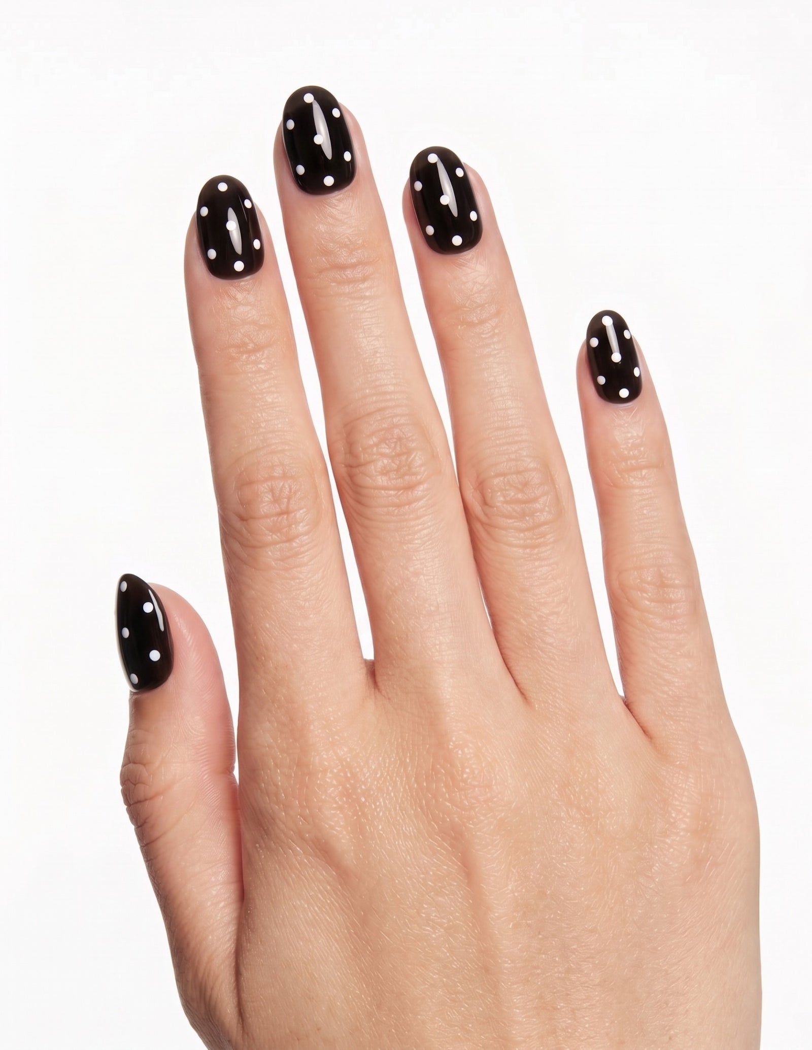 Dice press-on nails — Almond (extra-short), light-skin hand, back of hand