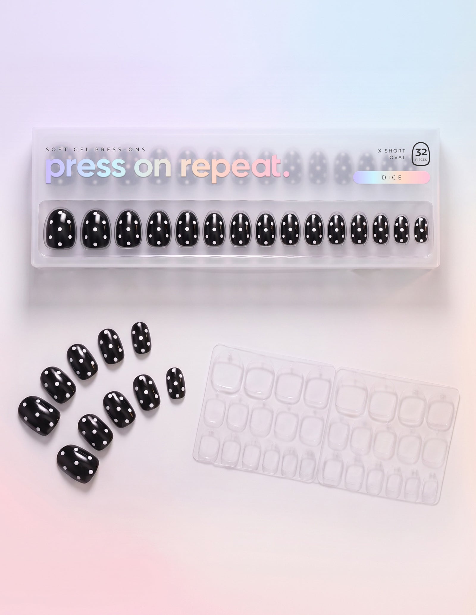 Dice press-on nails — Oval (extra-short) retail box with loose nails and adhesive tabs