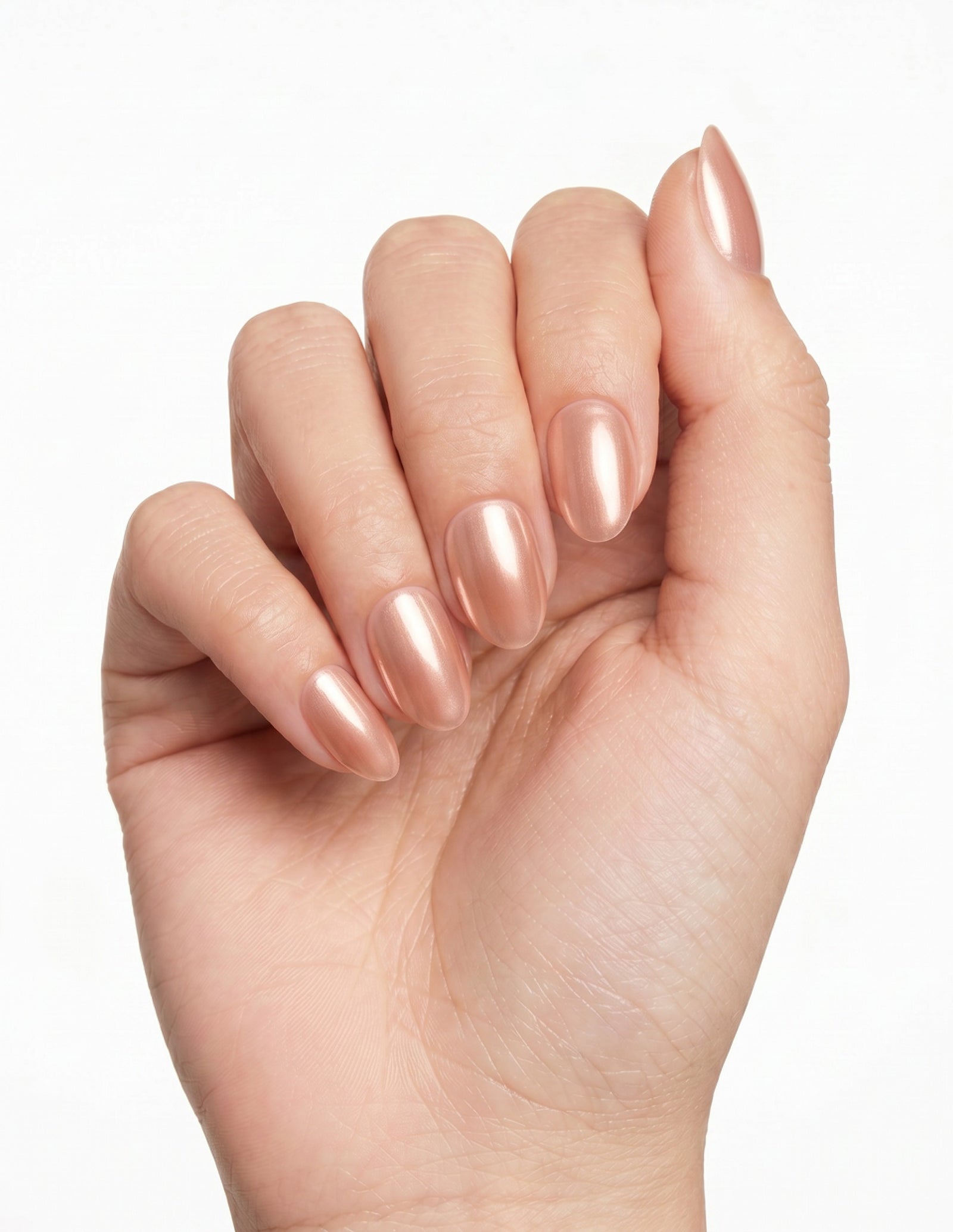 Rose Chrome press-on nails — Almond (extra-short), light-skin hand, fingers curled