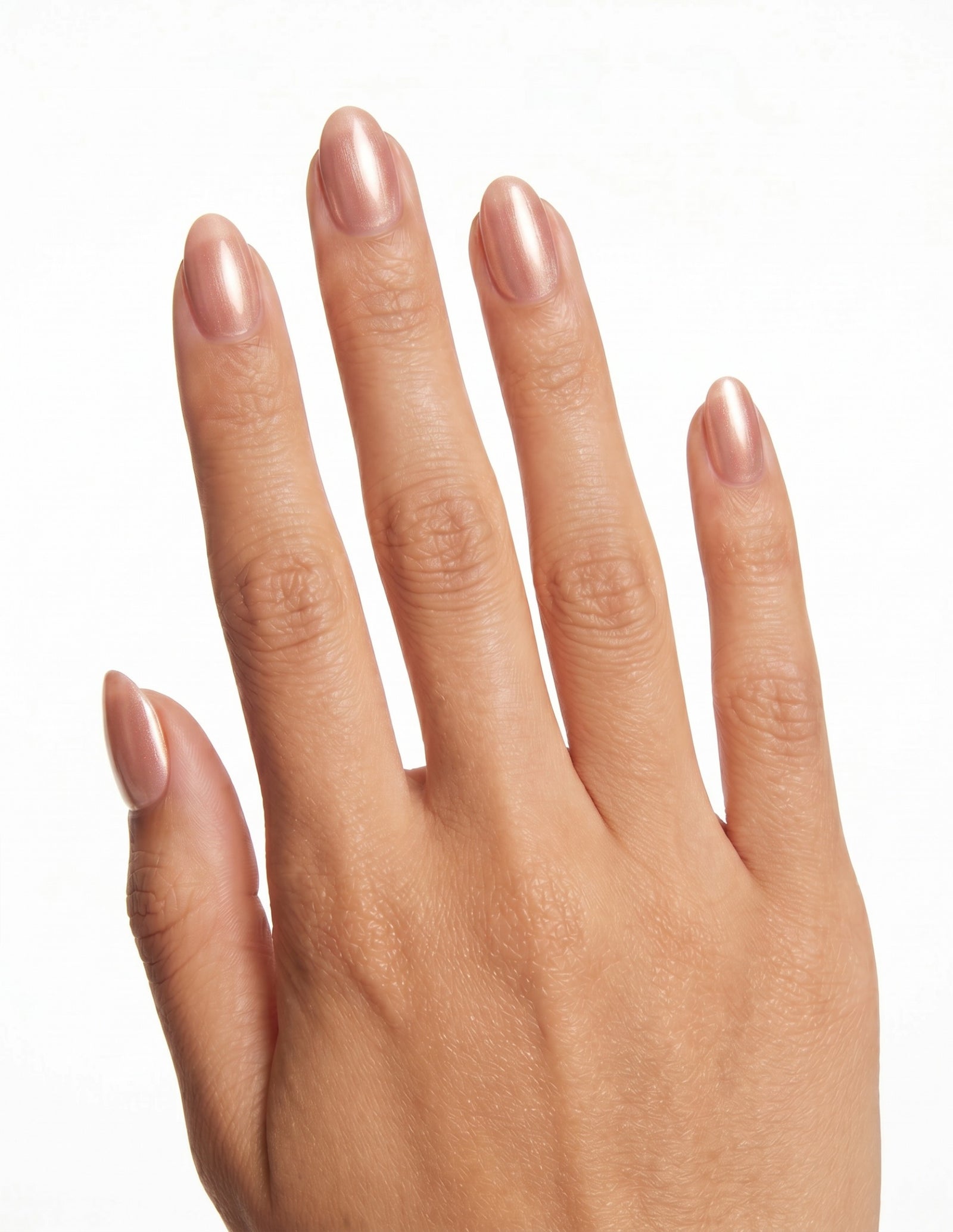 Rose Chrome press-on nails — Almond (extra-short), tan hand, back of hand