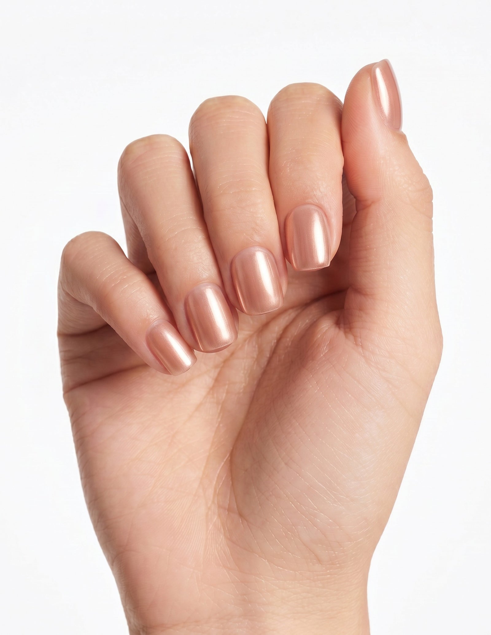 Rose Chrome press-on nails — Coffin (short), light-skin hand, fingers curled