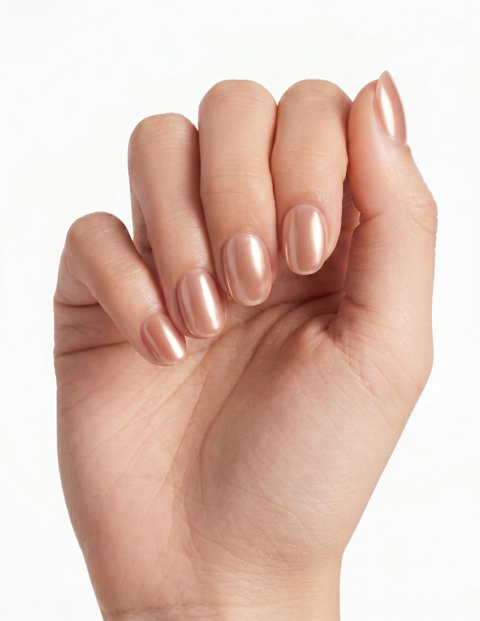 Rose Chrome press-on nails — Oval (extra-short), light-skin hand, fingers curled