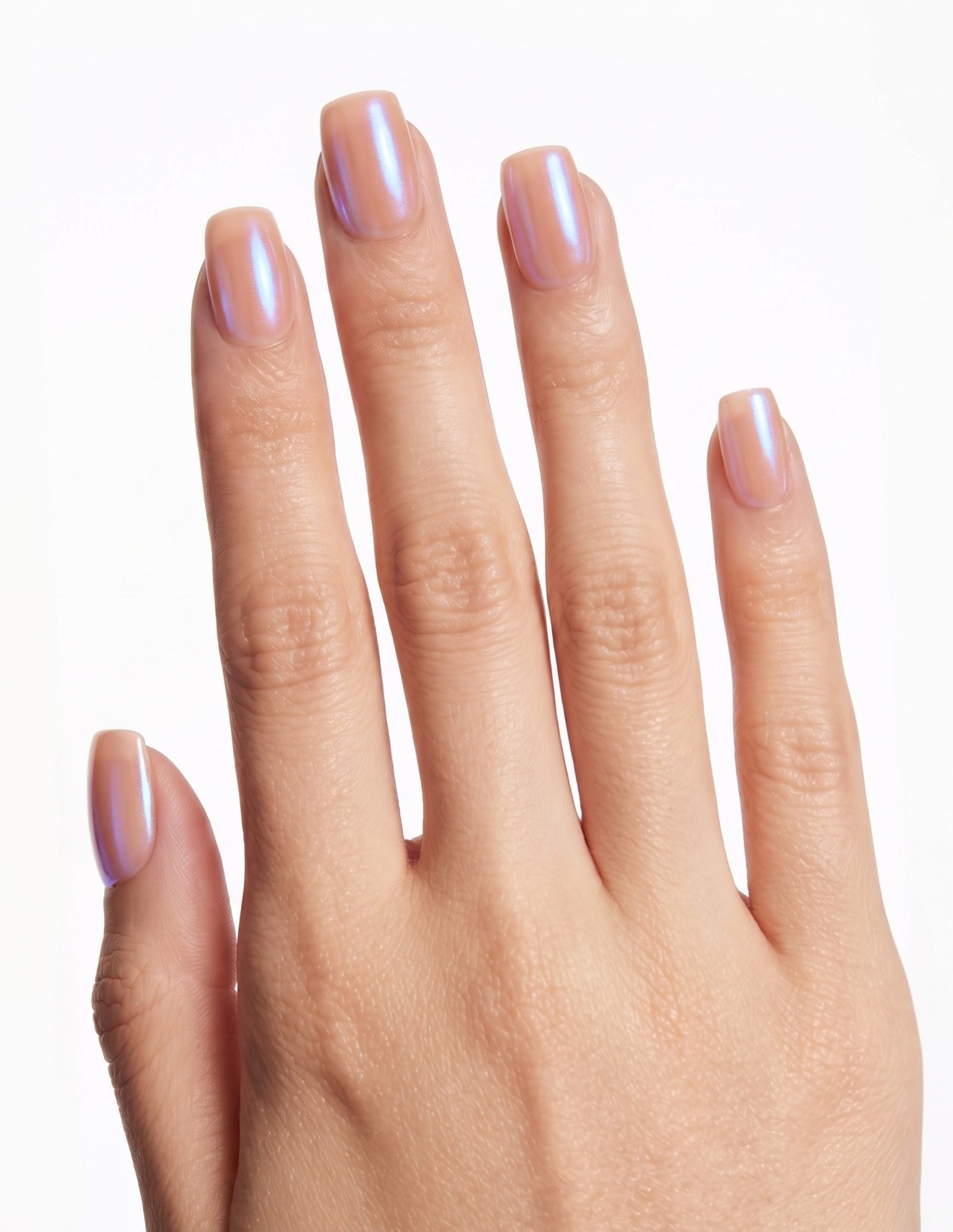 Peach Fuzz press-on nails — Coffin (short), light-skin hand, back of hand